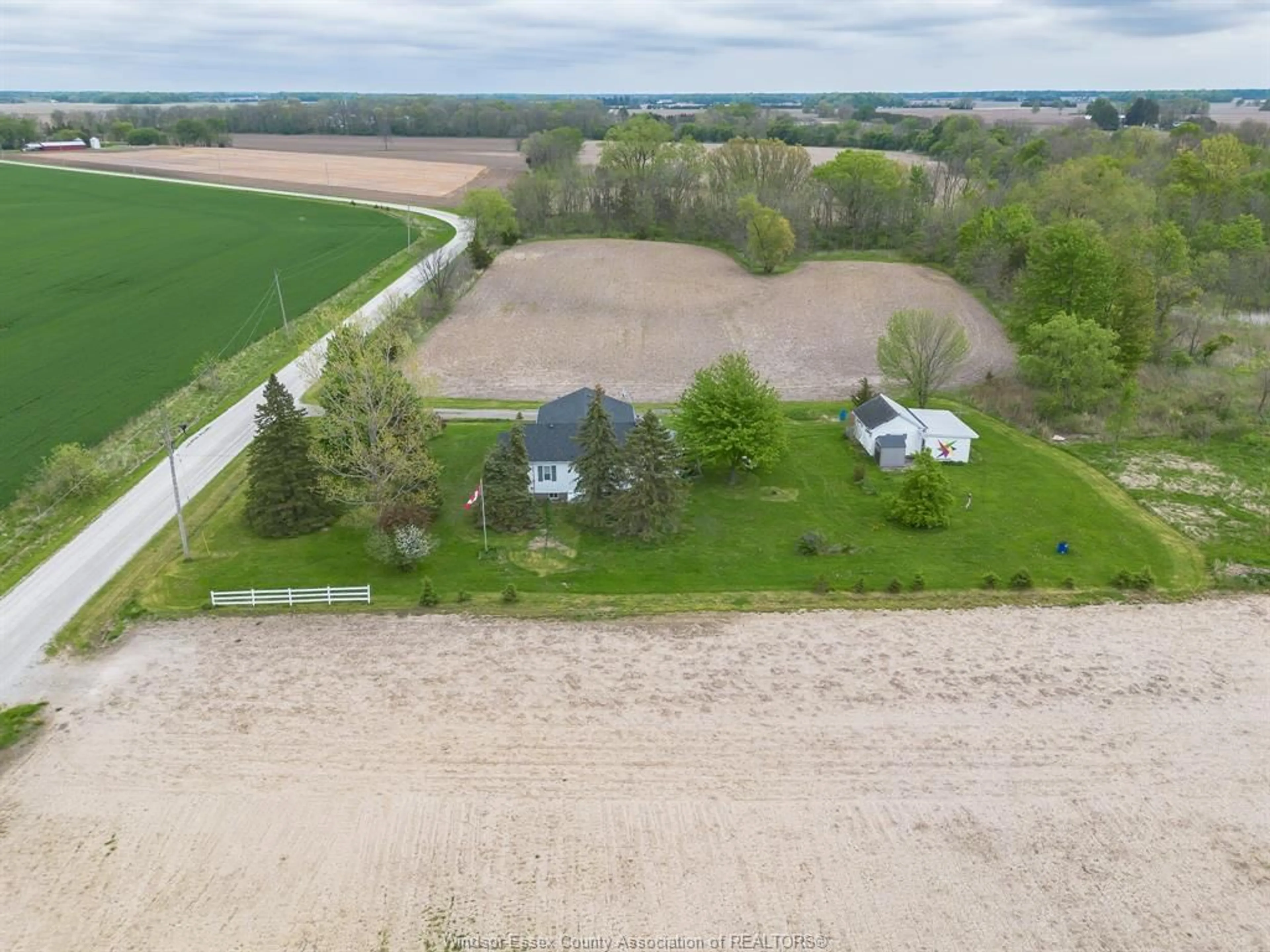 A pic from outside/outdoor area/front of a property/back of a property/a pic from drone, water/lake/river/ocean view for 5839 Kent Line, Croton Ontario N0P 1K0