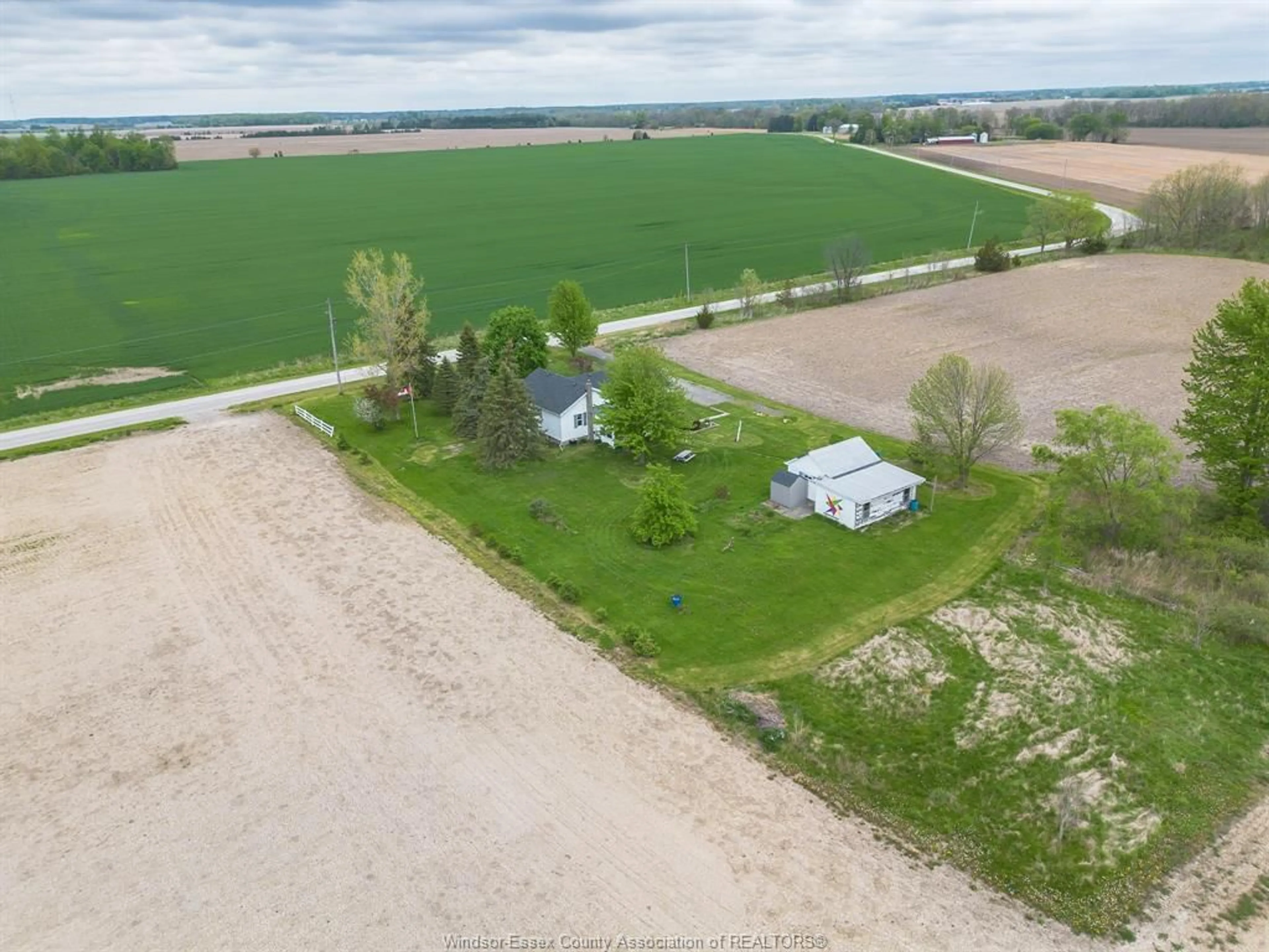 A pic from outside/outdoor area/front of a property/back of a property/a pic from drone, water/lake/river/ocean view for 5839 Kent Line, Croton Ontario N0P 1K0