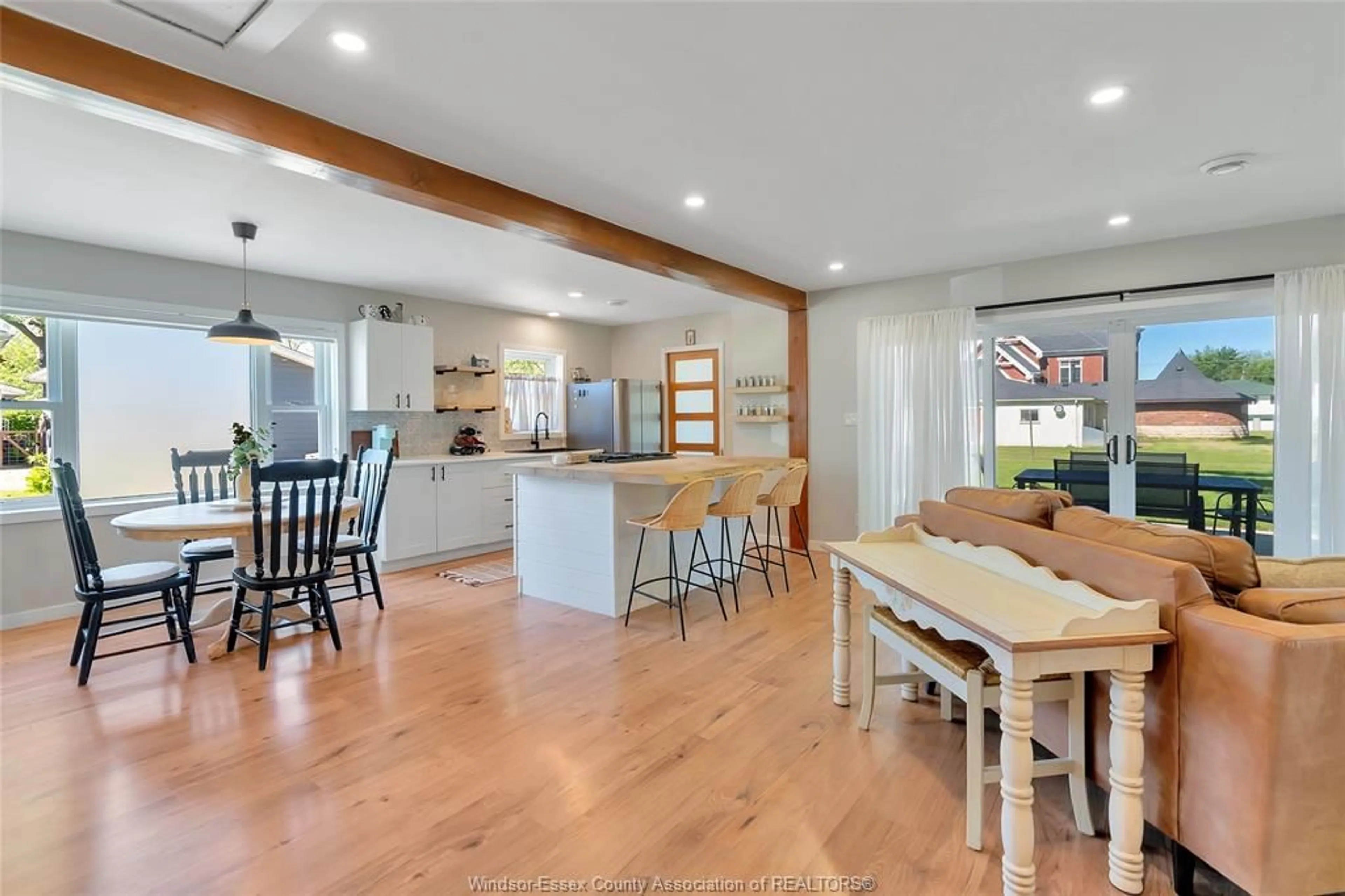 Open concept kitchen, wood/laminate floor for 2615 Victoria St, Woodslee Ontario N0R 1V0