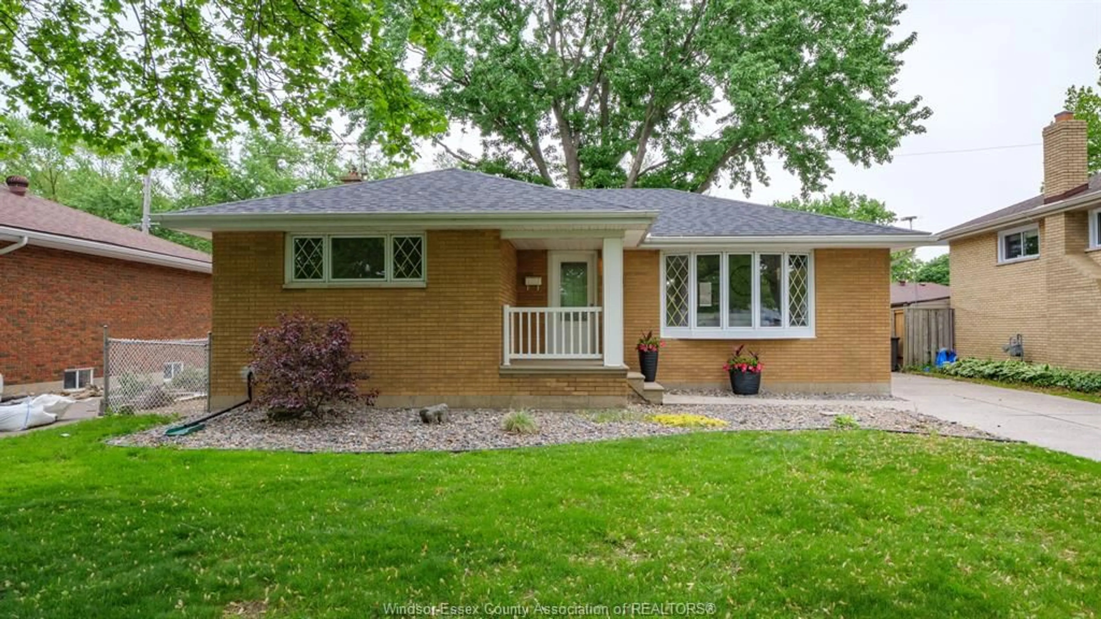 Home with brick exterior material, street for 428 Lori St, Windsor Ontario N8S 3Y2