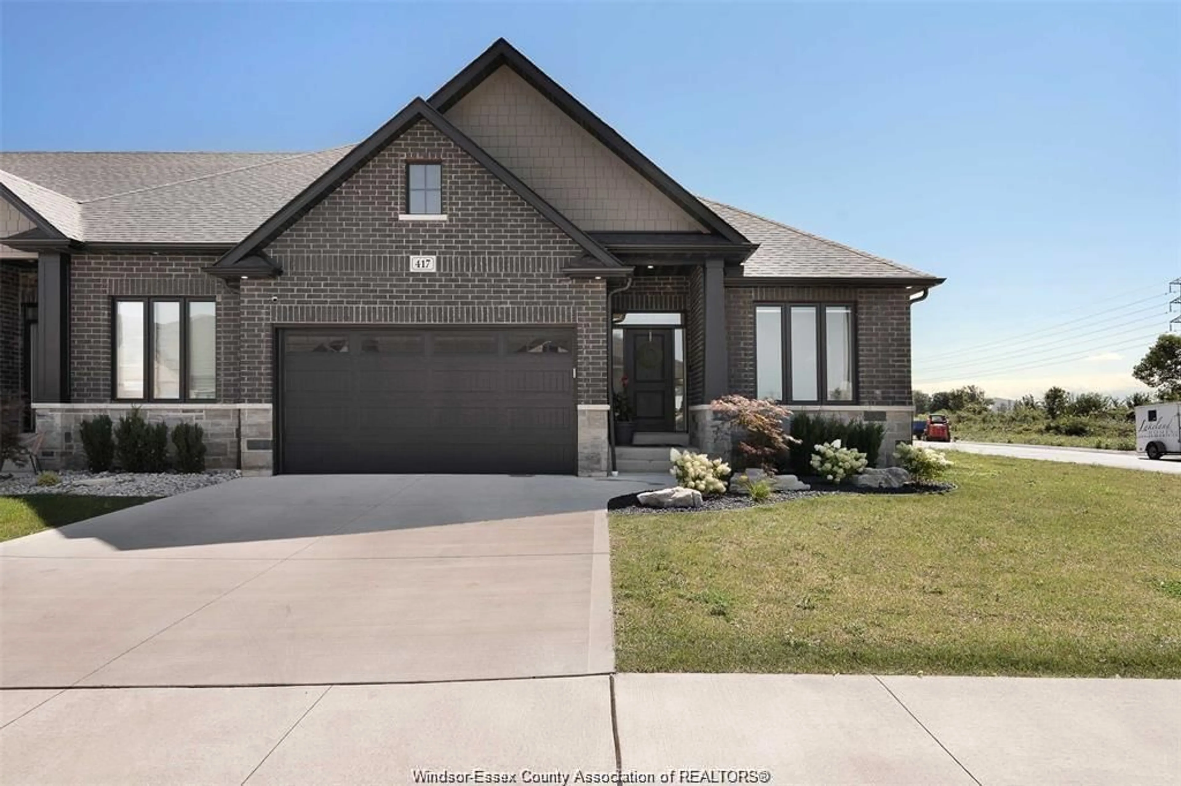 Home with brick exterior material, street for 417 MATESE, Lakeshore Ontario N0R 1A0