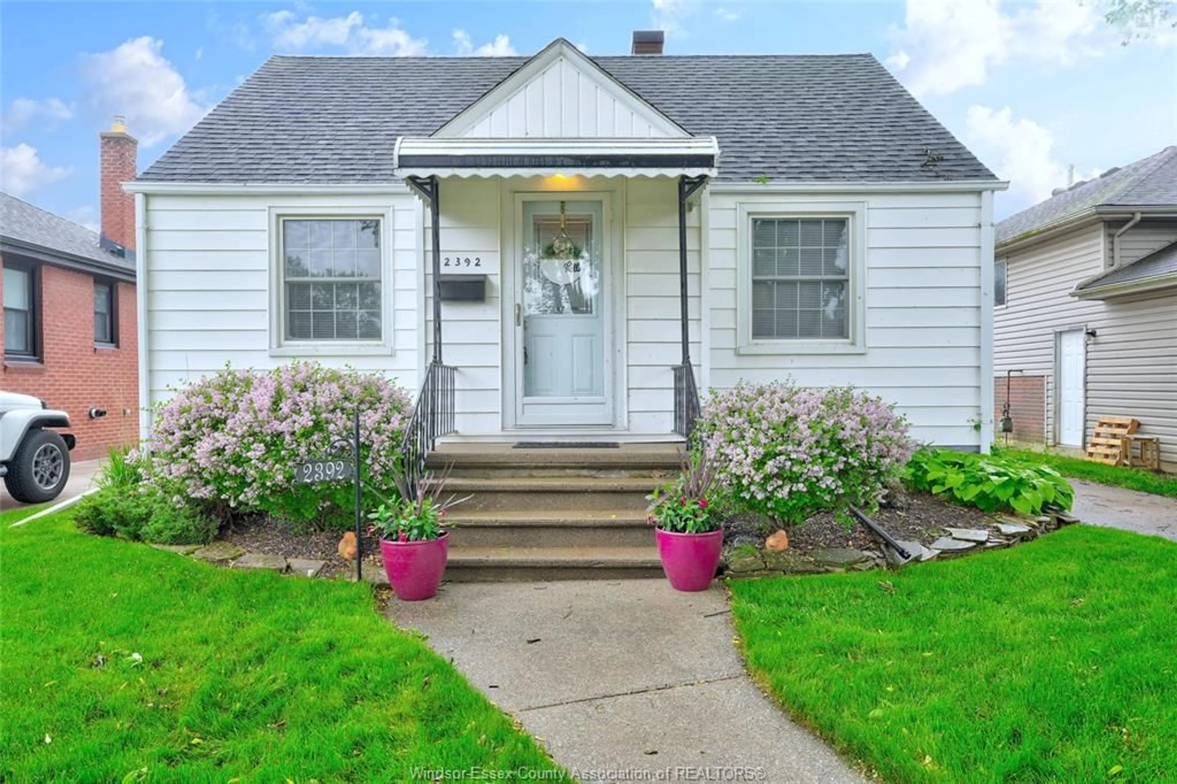 Home with vinyl exterior material, street for 2392 BERNARD, Windsor Ontario N8W 4R8