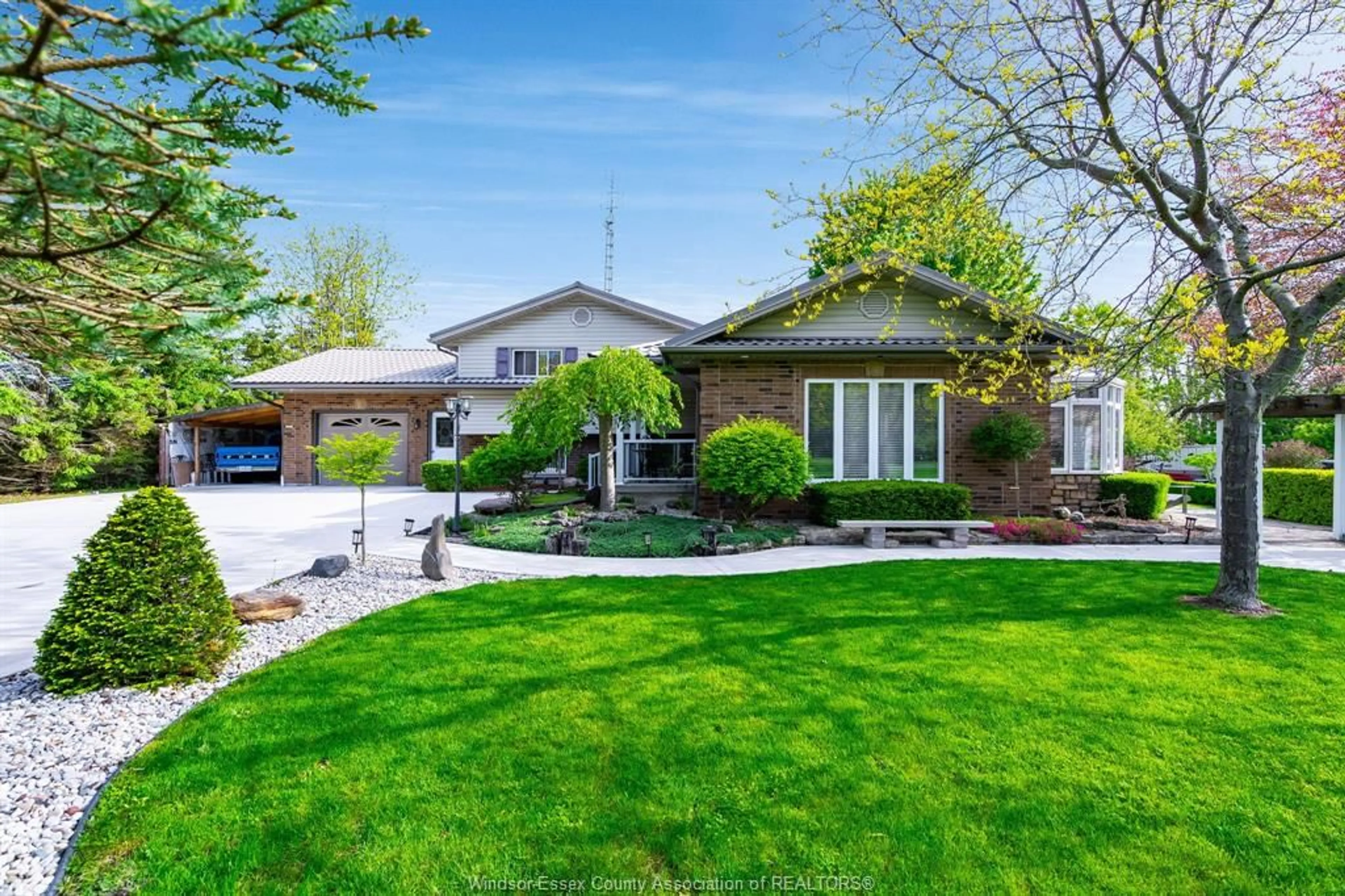 Home with brick exterior material, street for 1927 Deer Run Rd, Leamington Ontario N8H 3V7