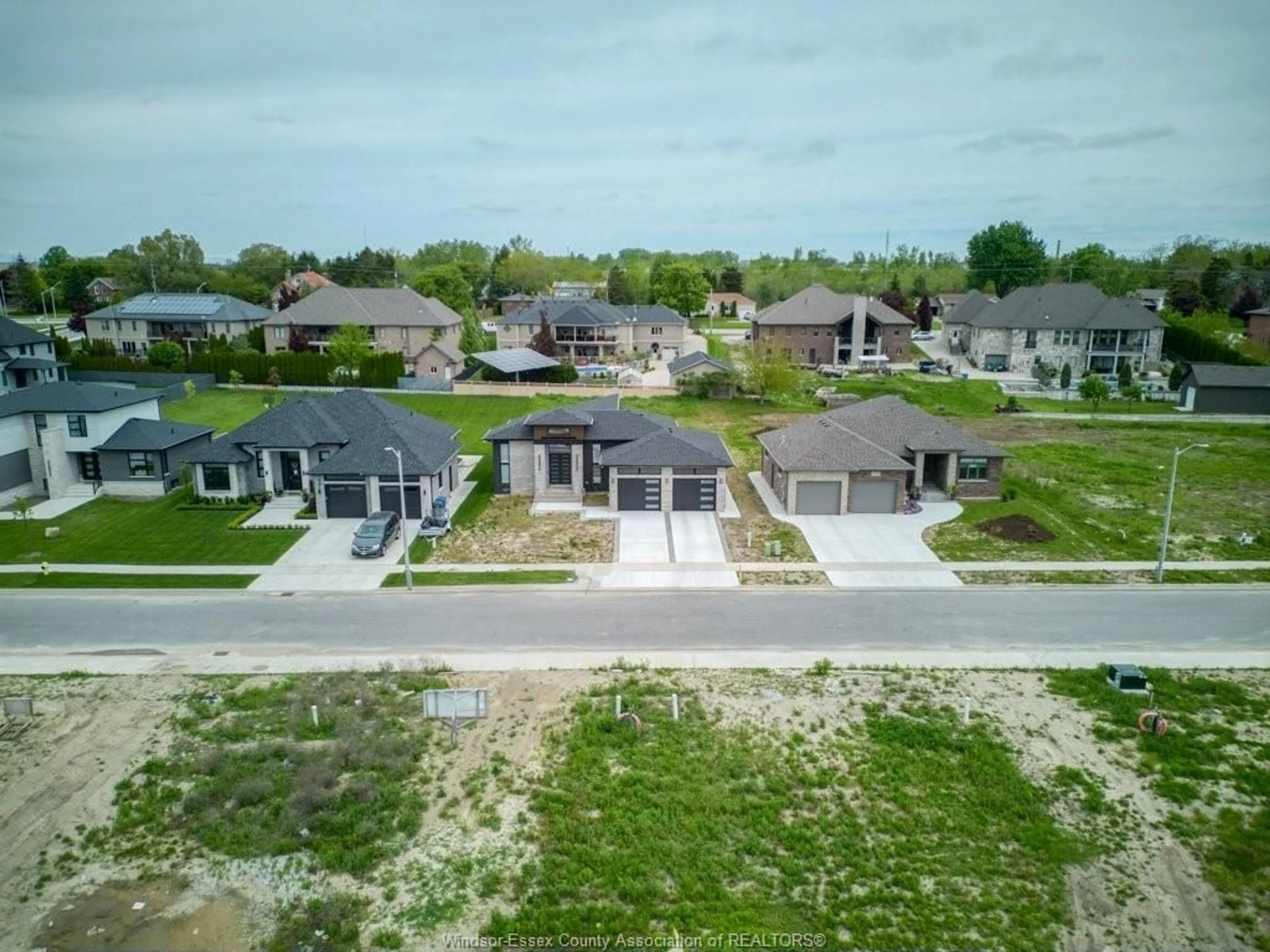 A pic from outside/outdoor area/front of a property/back of a property/a pic from drone, street for 1936 VILLA CANAL, Ruthven Ontario N0R 2G0