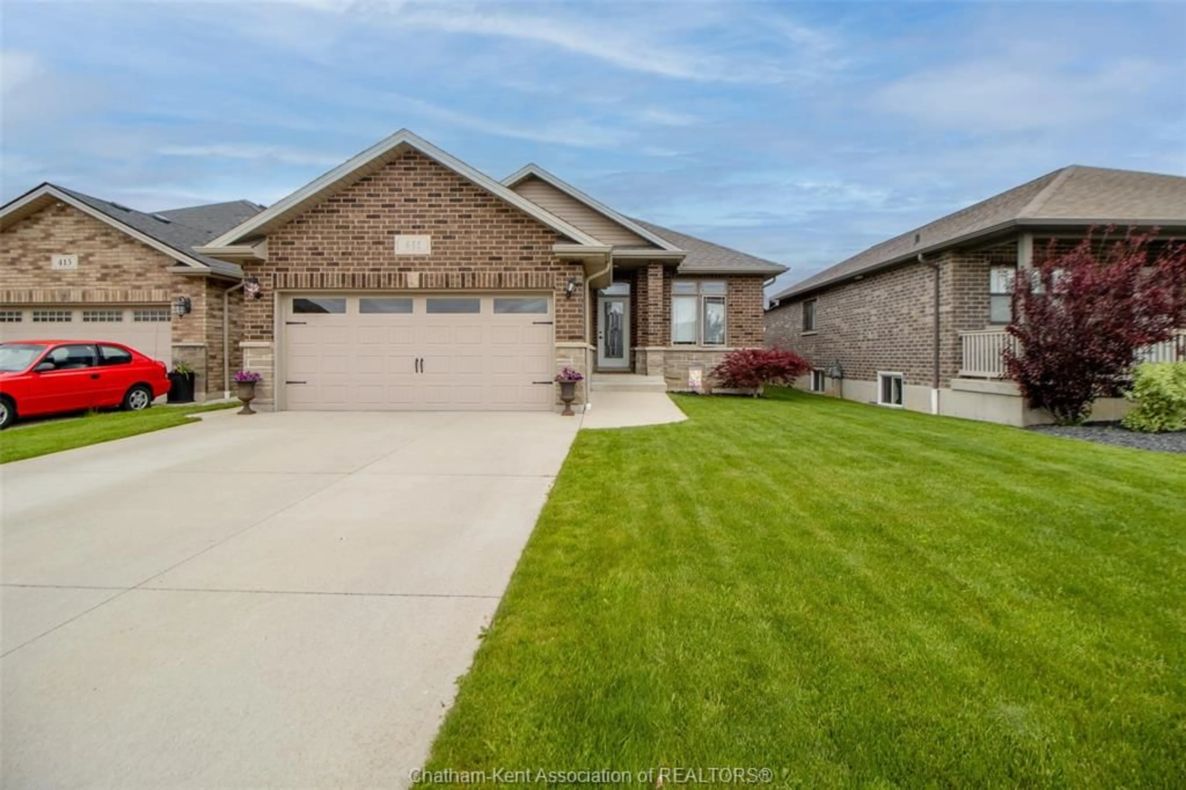 Home with brick exterior material, street for 411 TWILIGHT Trail, Chatham Ontario N7L 0B9