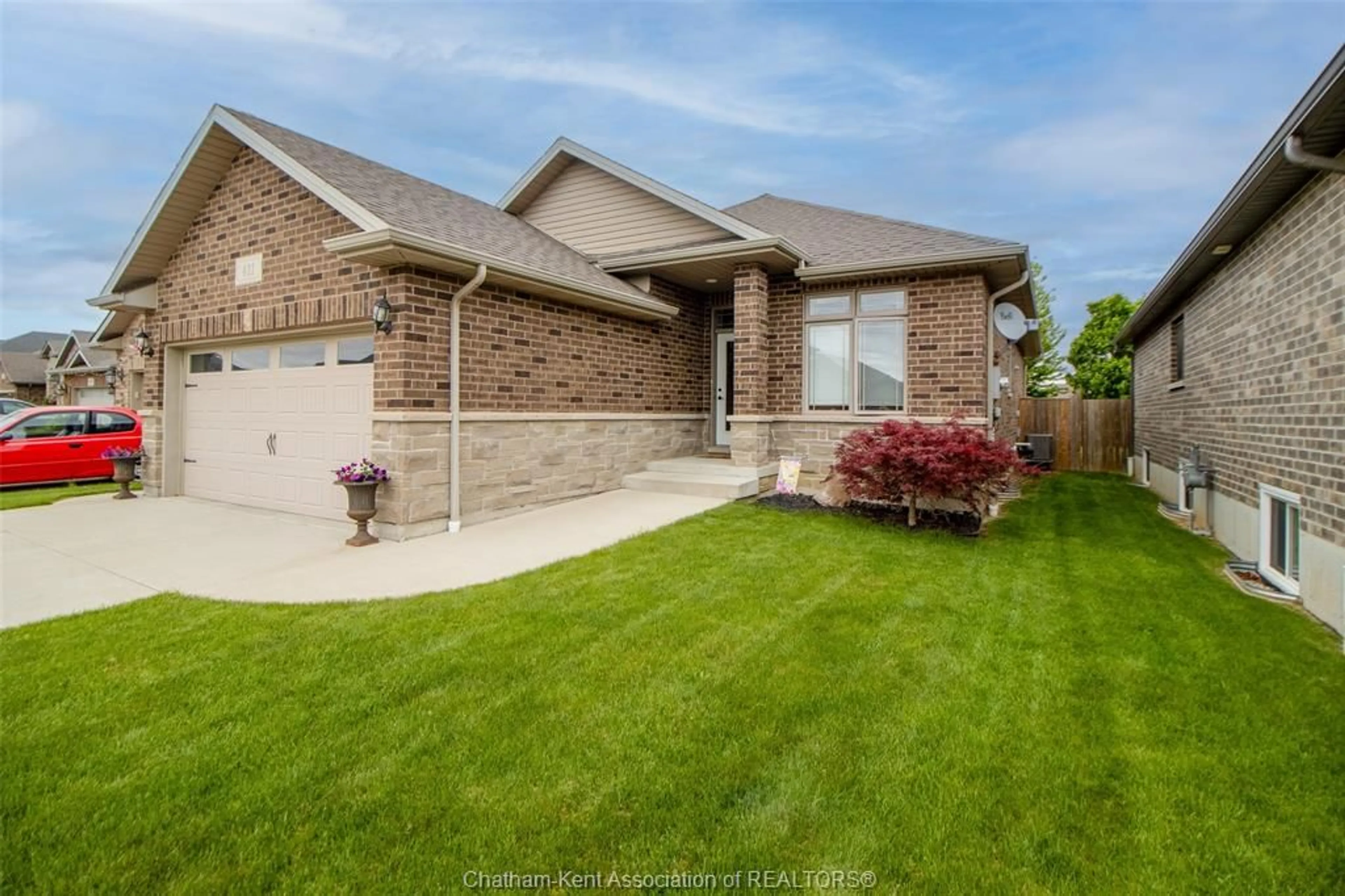 Home with brick exterior material, street for 411 TWILIGHT Trail, Chatham Ontario N7L 0B9