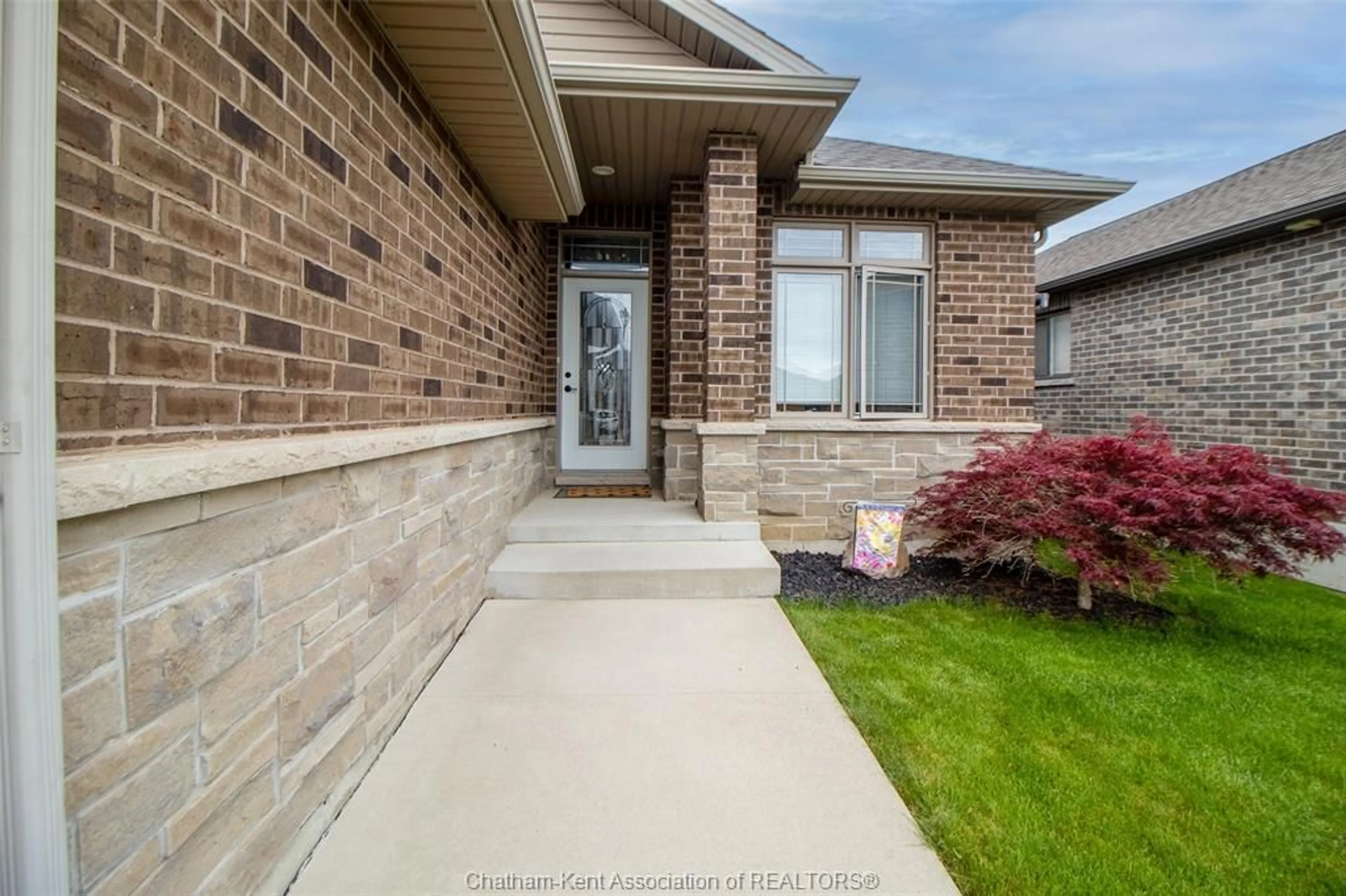 Home with brick exterior material, street for 411 TWILIGHT Trail, Chatham Ontario N7L 0B9