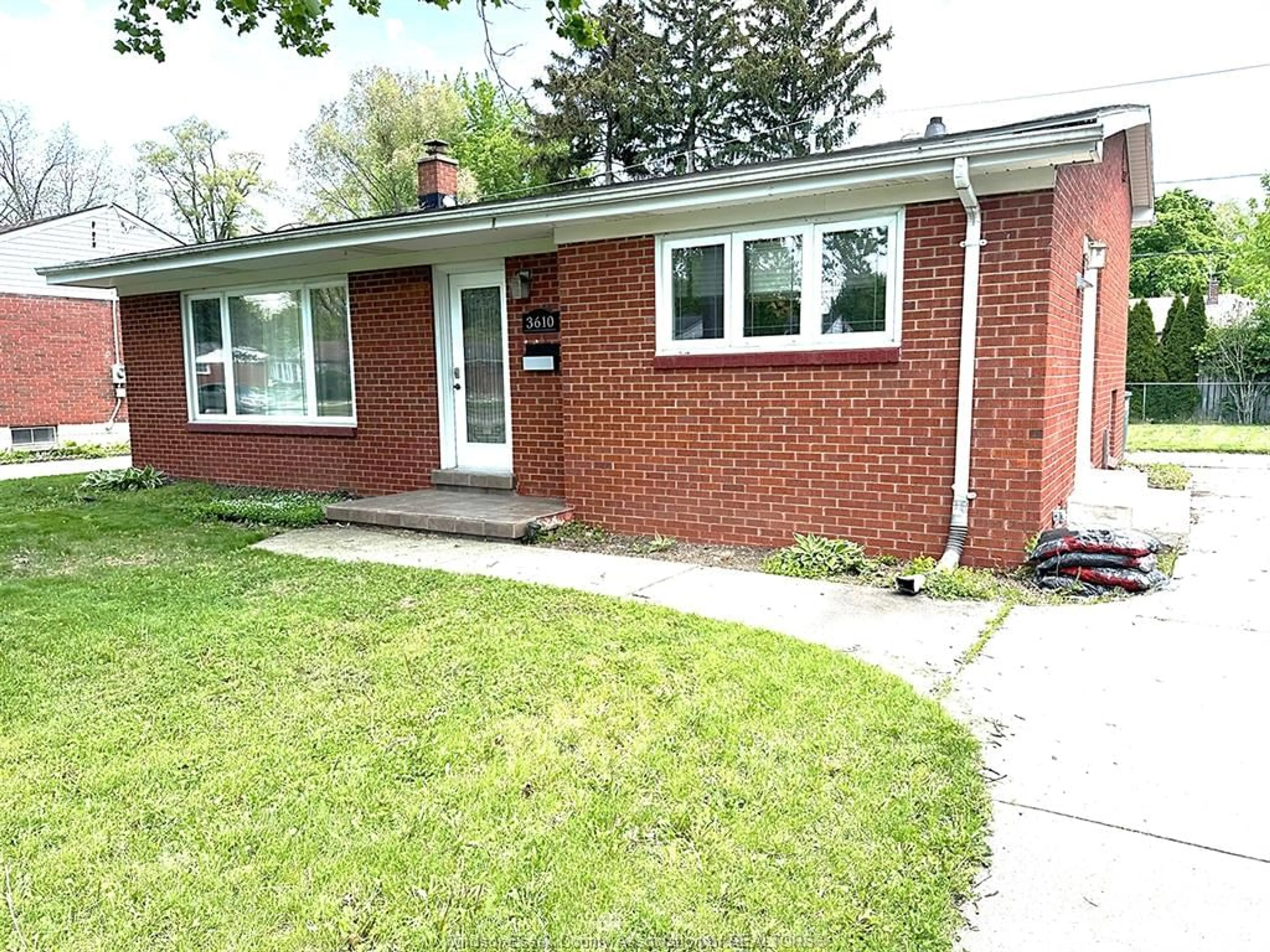 Home with brick exterior material, street for 3610 Woodland, Windsor Ontario N9E 1Z8