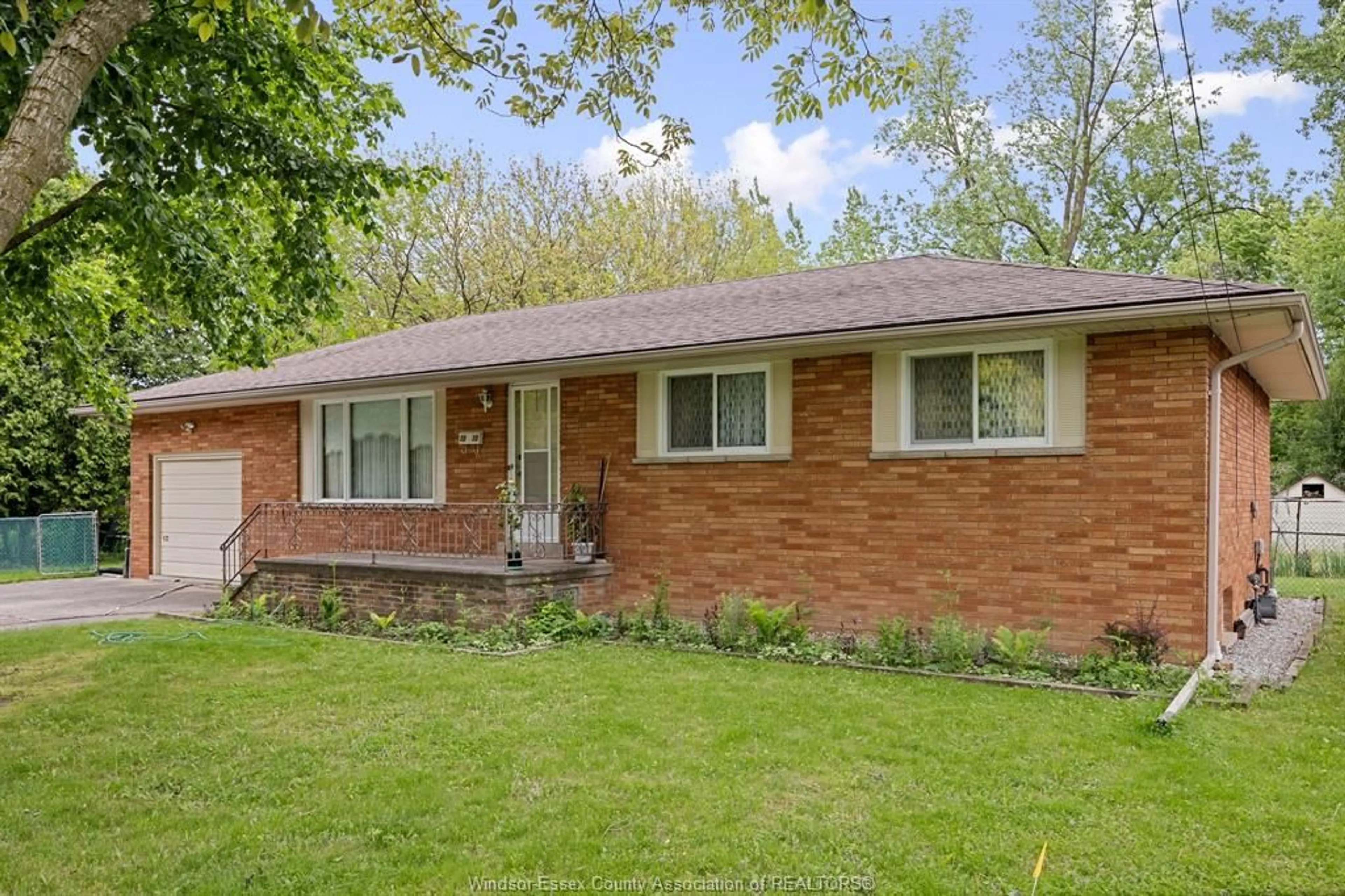Home with brick exterior material, street for 1910 KENT St, Windsor Ontario N9E 3R3
