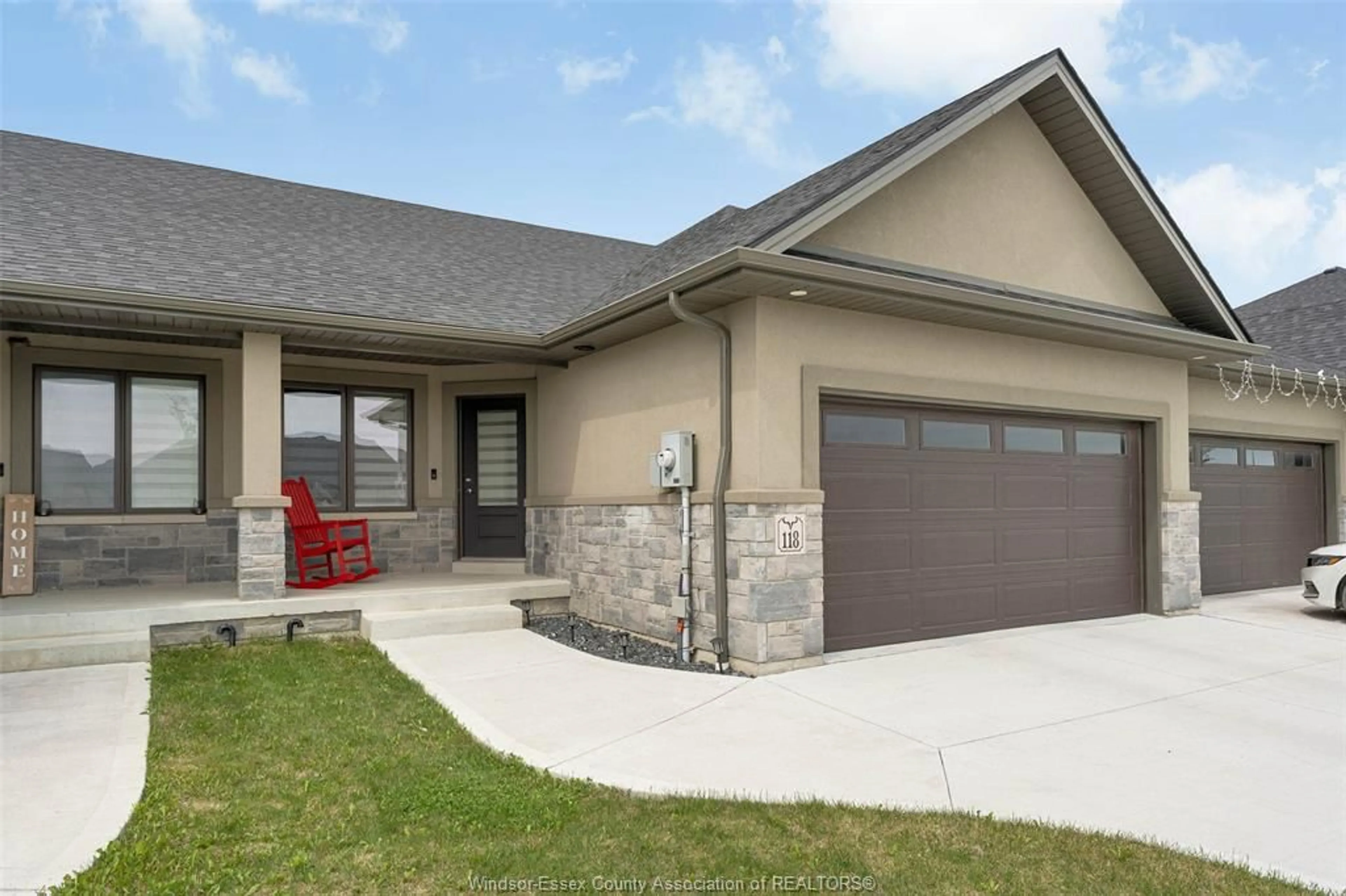 Home with brick exterior material, street for 118 JONES St, Essex Ontario N8M 0B2
