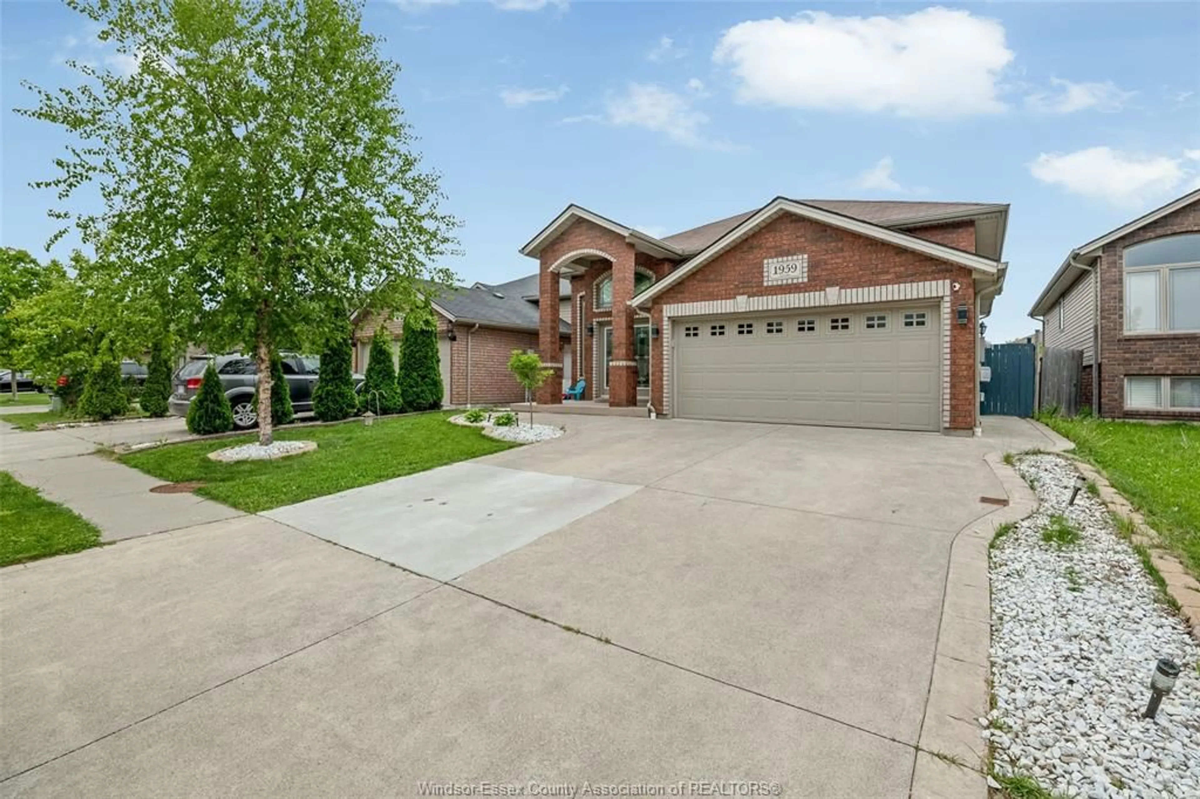 Home with brick exterior material, street for 1959 MCKAY Avenue, Windsor Ontario N9B 0B3