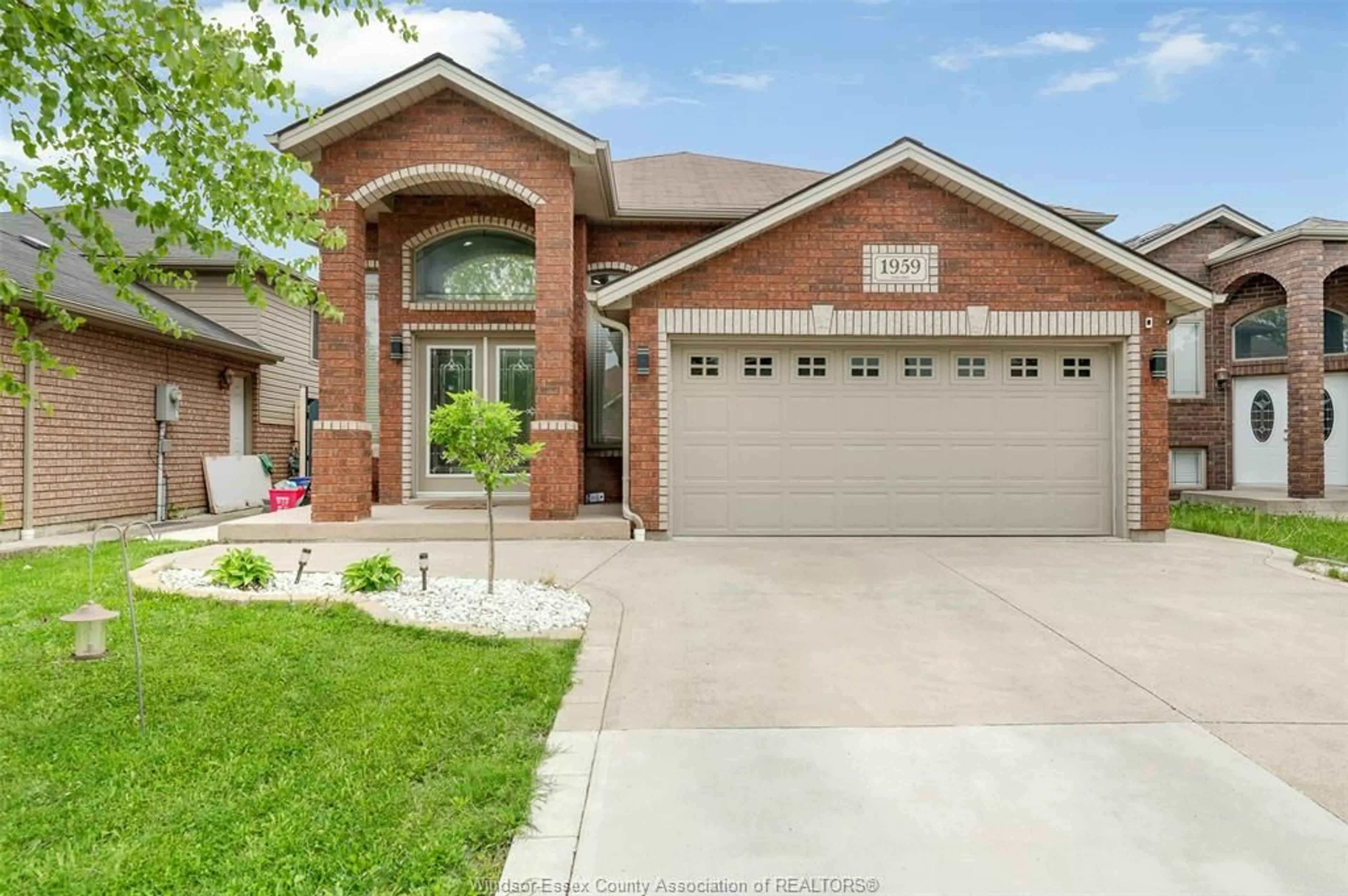 Home with brick exterior material, street for 1959 MCKAY Avenue, Windsor Ontario N9B 0B3