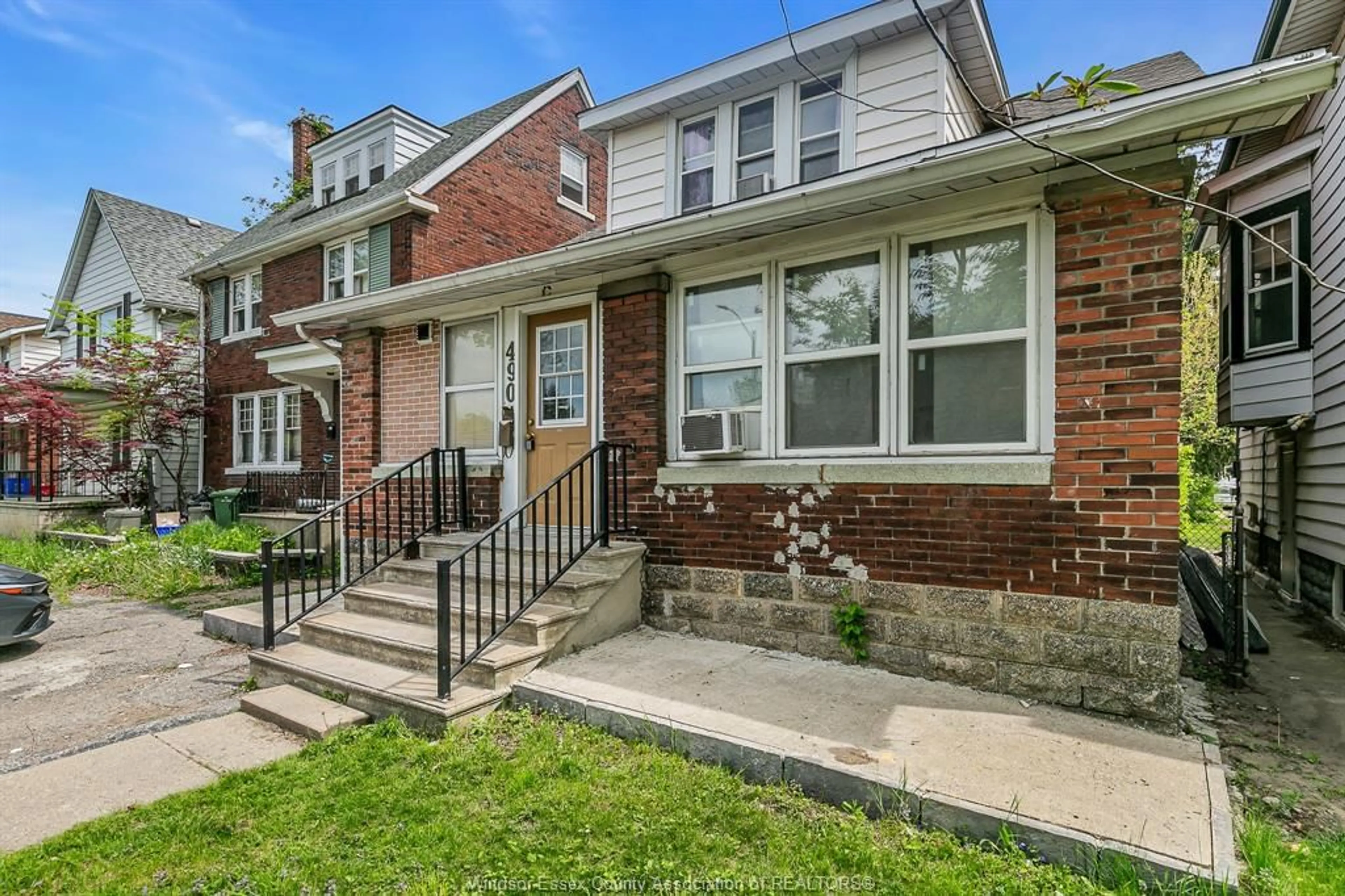 Home with brick exterior material, street for 490 Campbell Ave, Windsor Ontario N9B 2H4