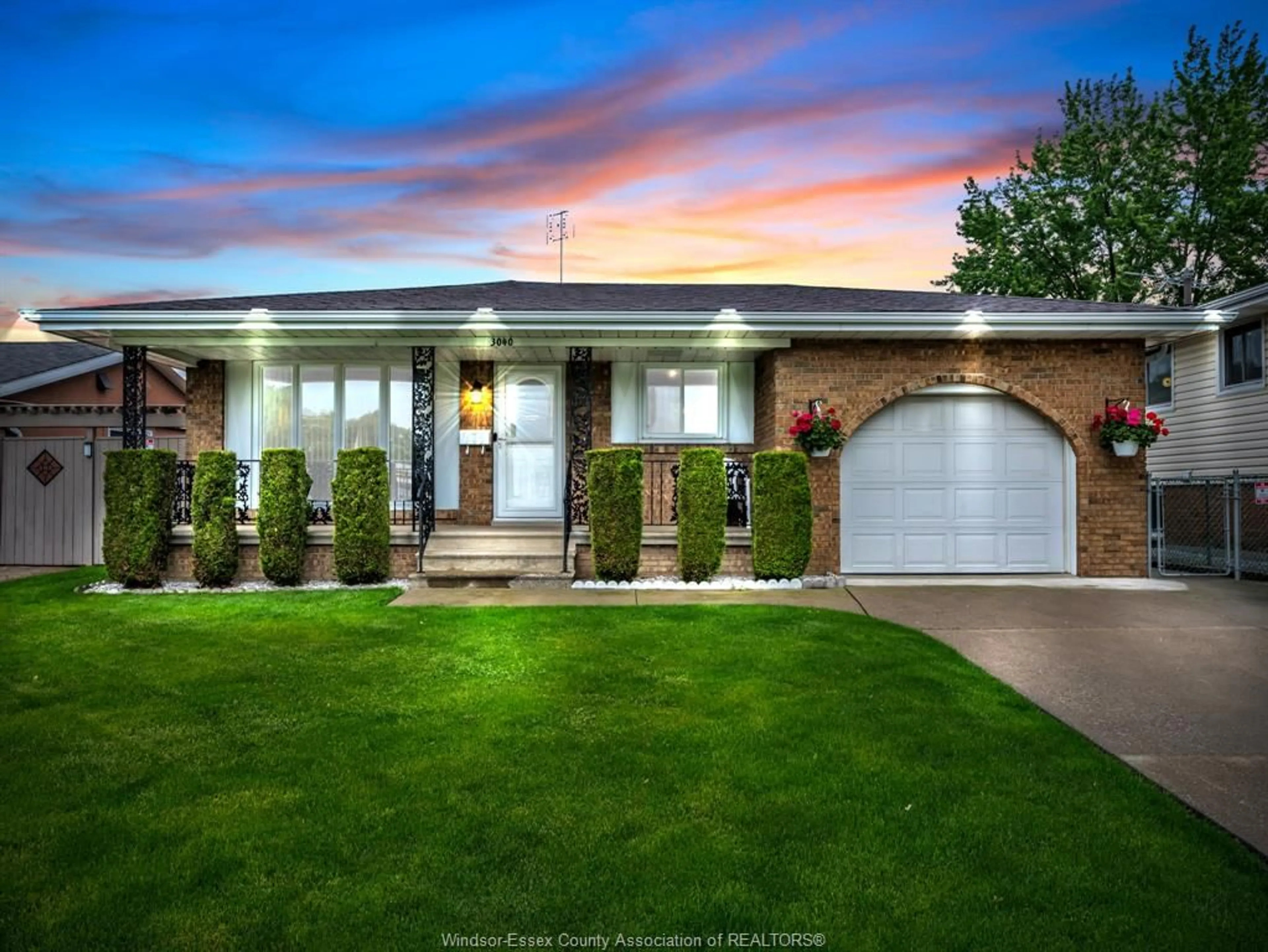 Home with brick exterior material, street for 3040 FOREST GLADE Dr, Windsor Ontario N8R 1L5