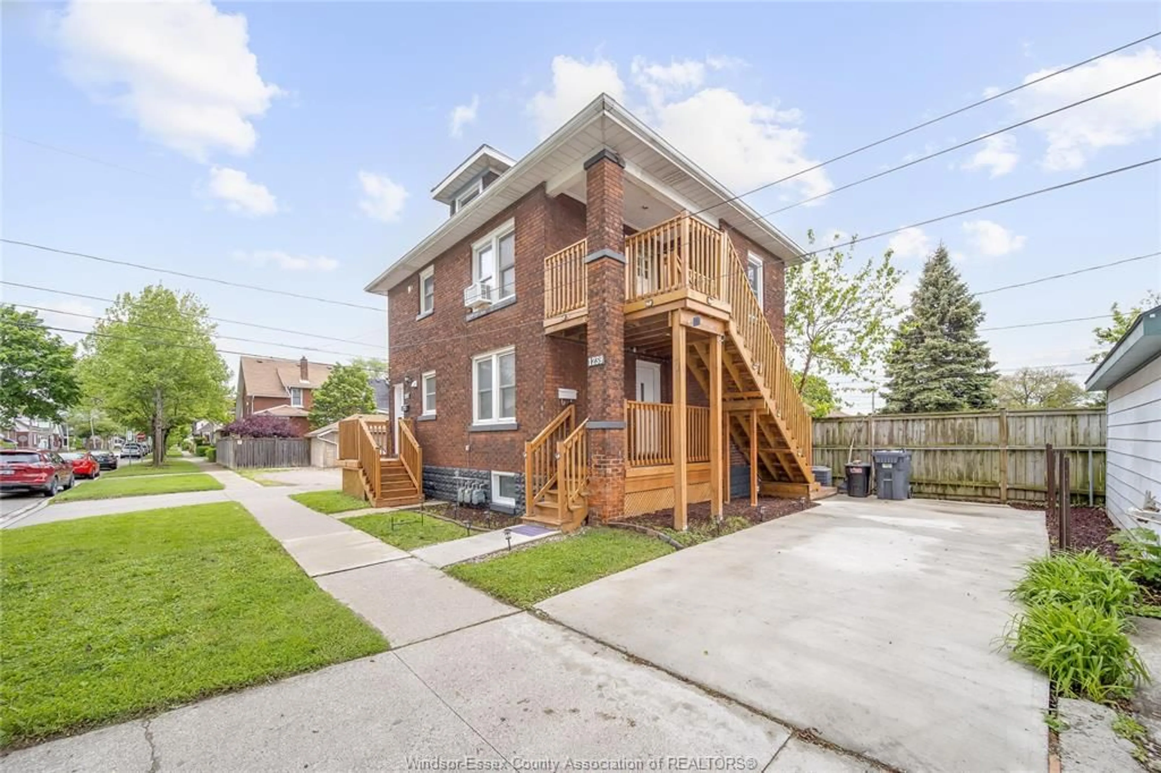 Home with brick exterior material, street for 1239-47 RICHMOND St, Windsor Ontario N9A 4A7