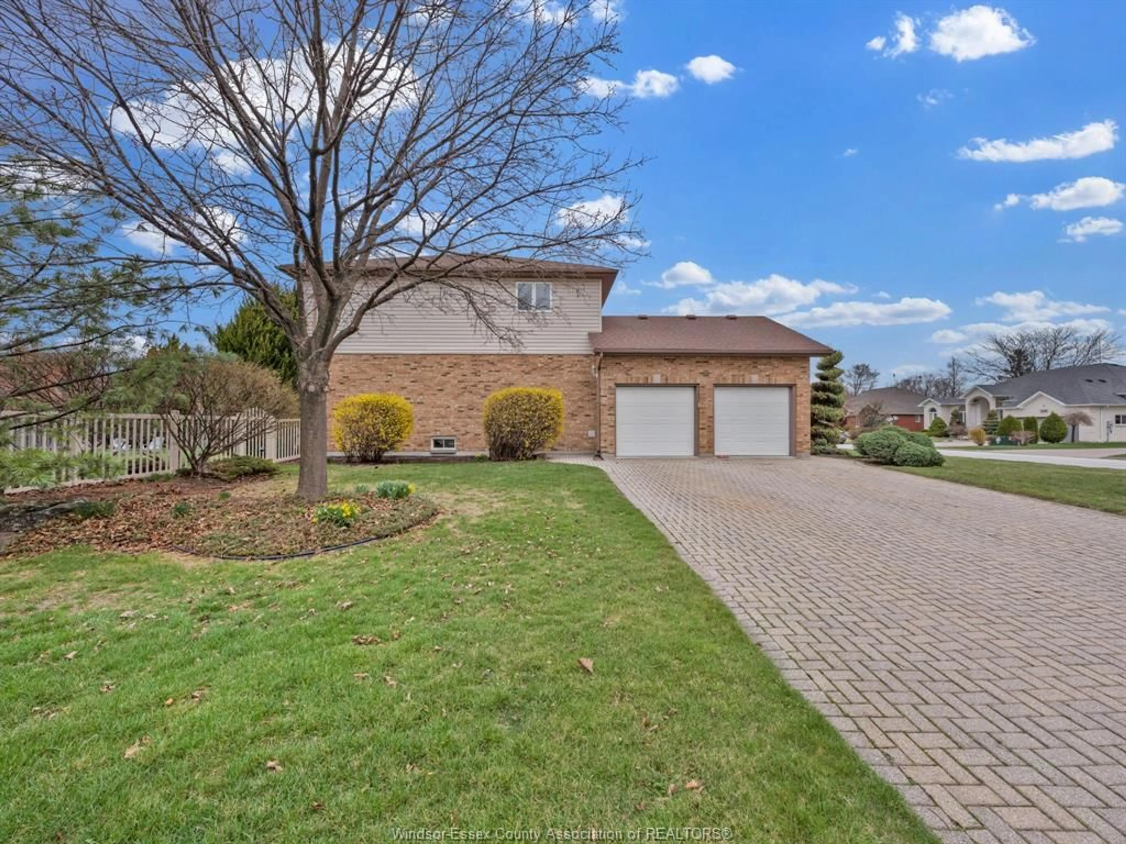 Home with brick exterior material, street for 137 SEYMOUR Cres, Lakeshore Ontario N8N 4X9