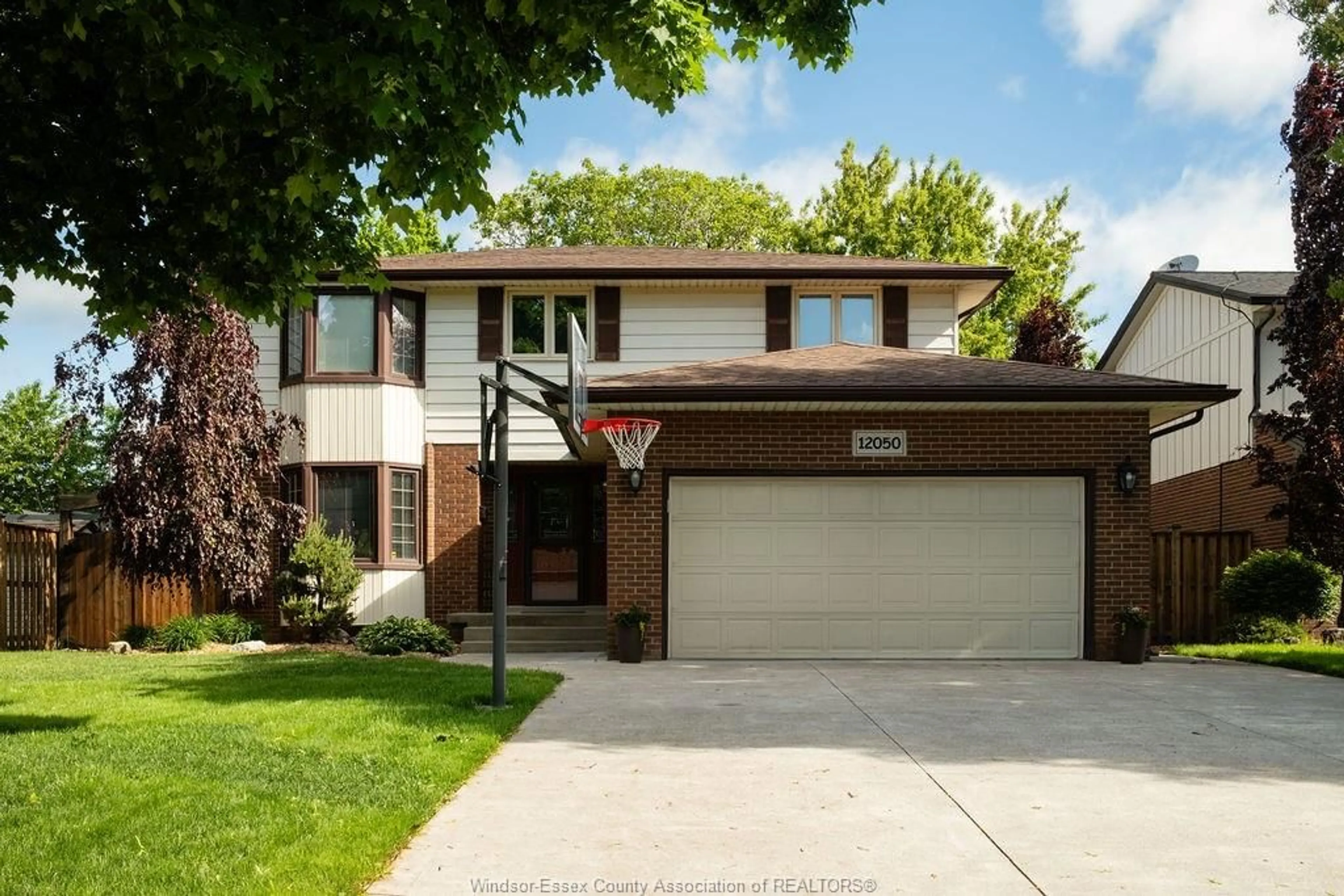 Home with brick exterior material, street for 12050 APPLETREE CRES Cres, Tecumseh Ontario N8N 4A5
