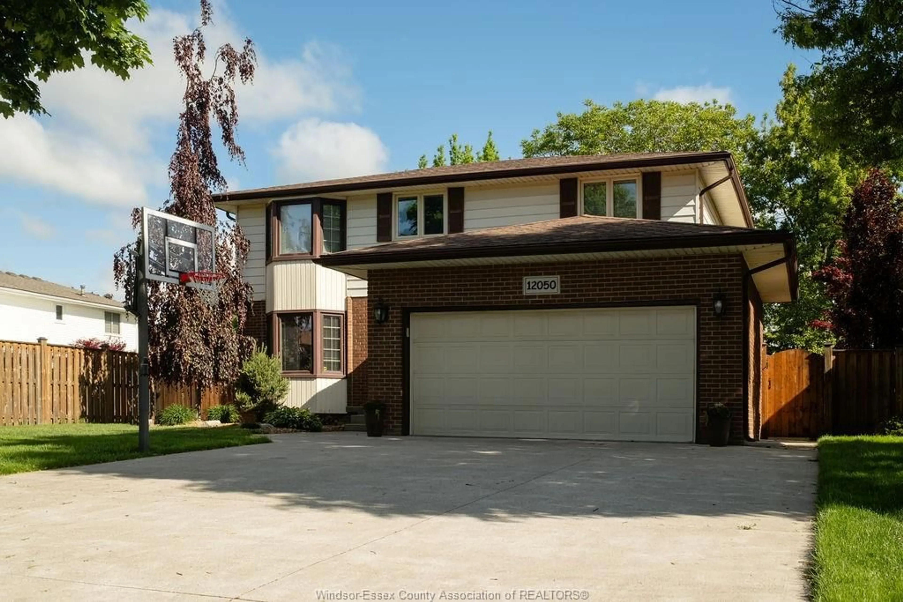 Home with vinyl exterior material, street for 12050 APPLETREE CRES Cres, Tecumseh Ontario N8N 4A5