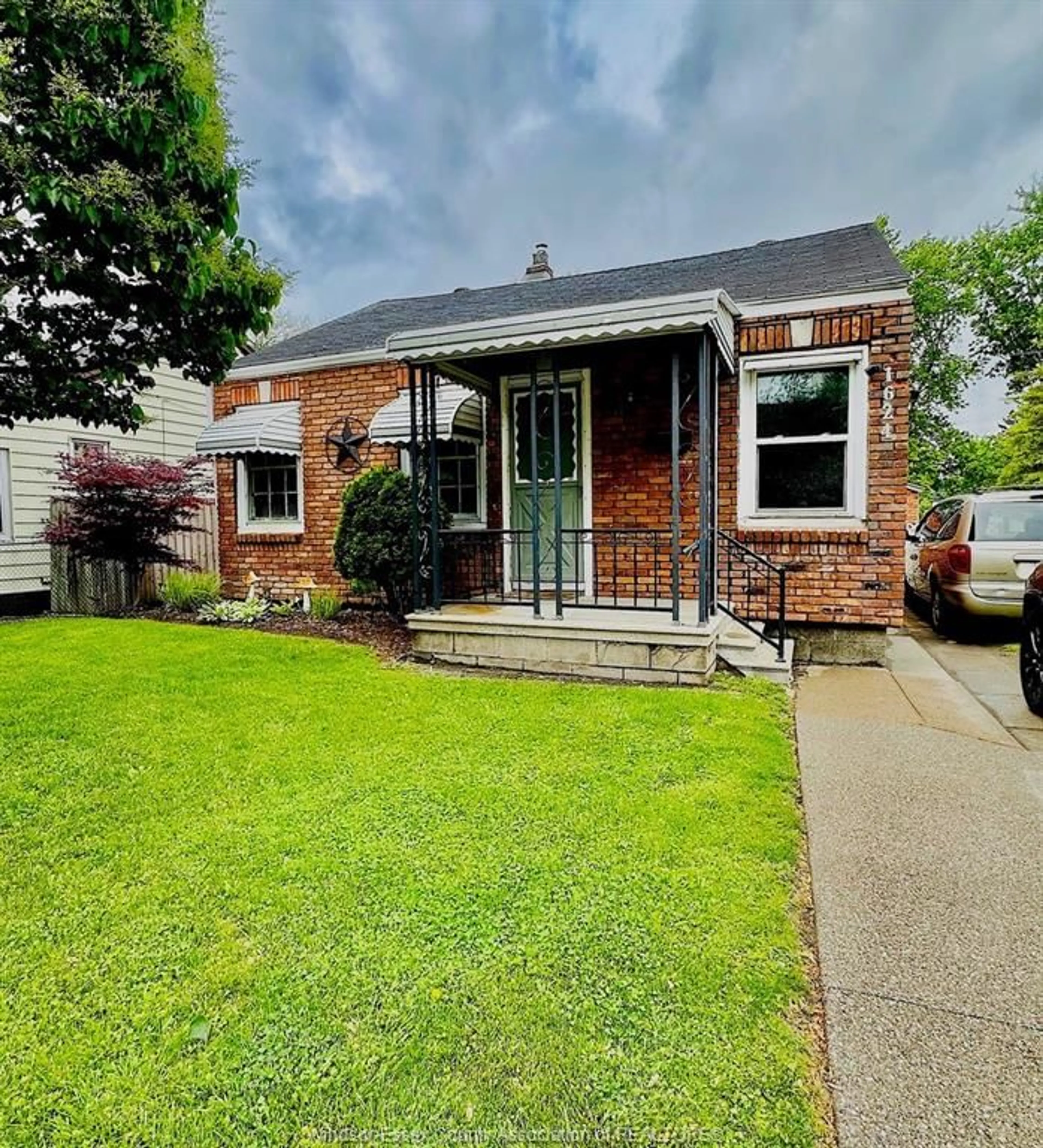 Home with brick exterior material, street for 1624 PRINCE Rd, Windsor Ontario N9C 3B7