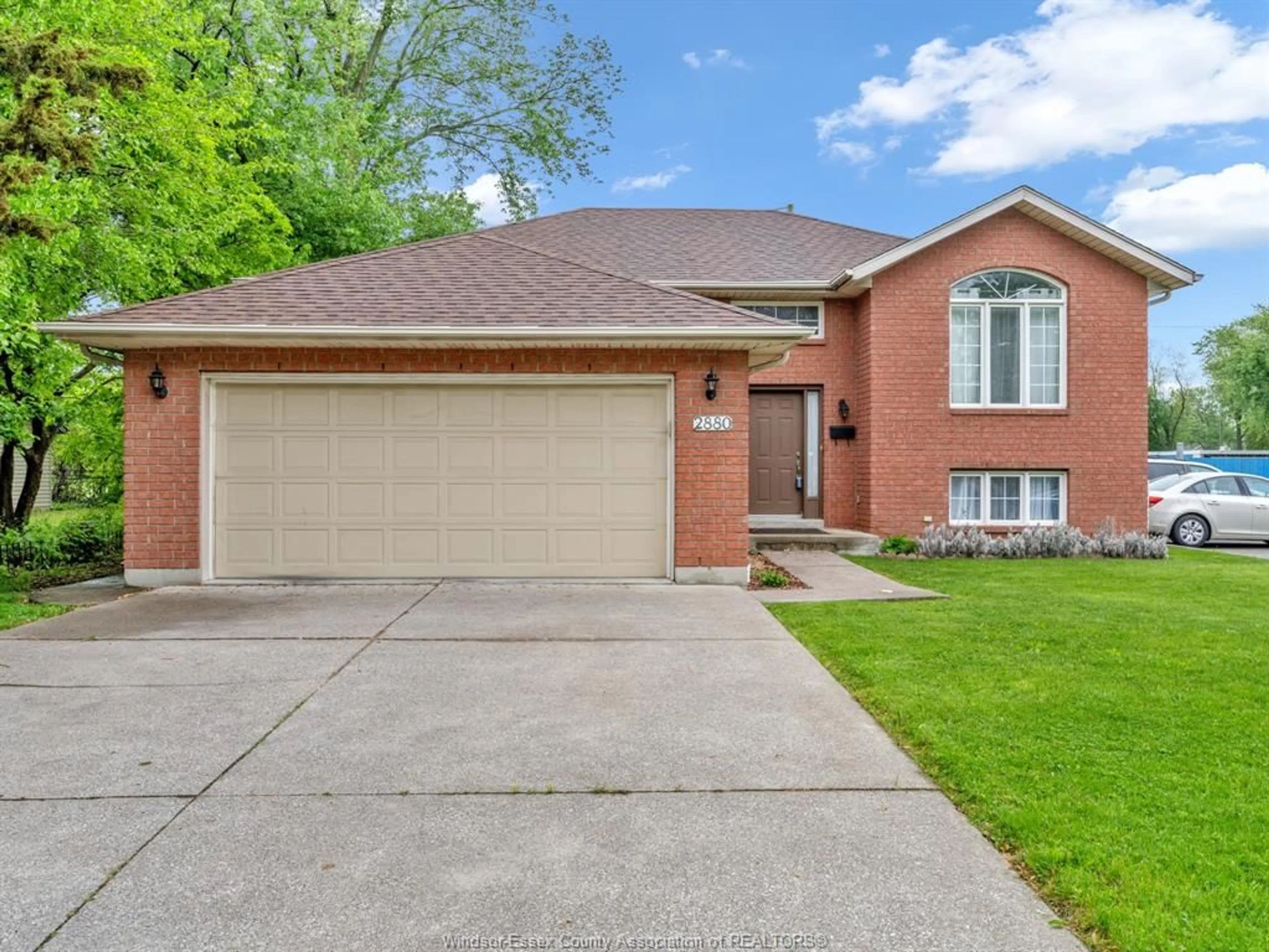 Home with brick exterior material, street for 2880 DOMINION Blvd, Windsor Ontario N9E 2M8