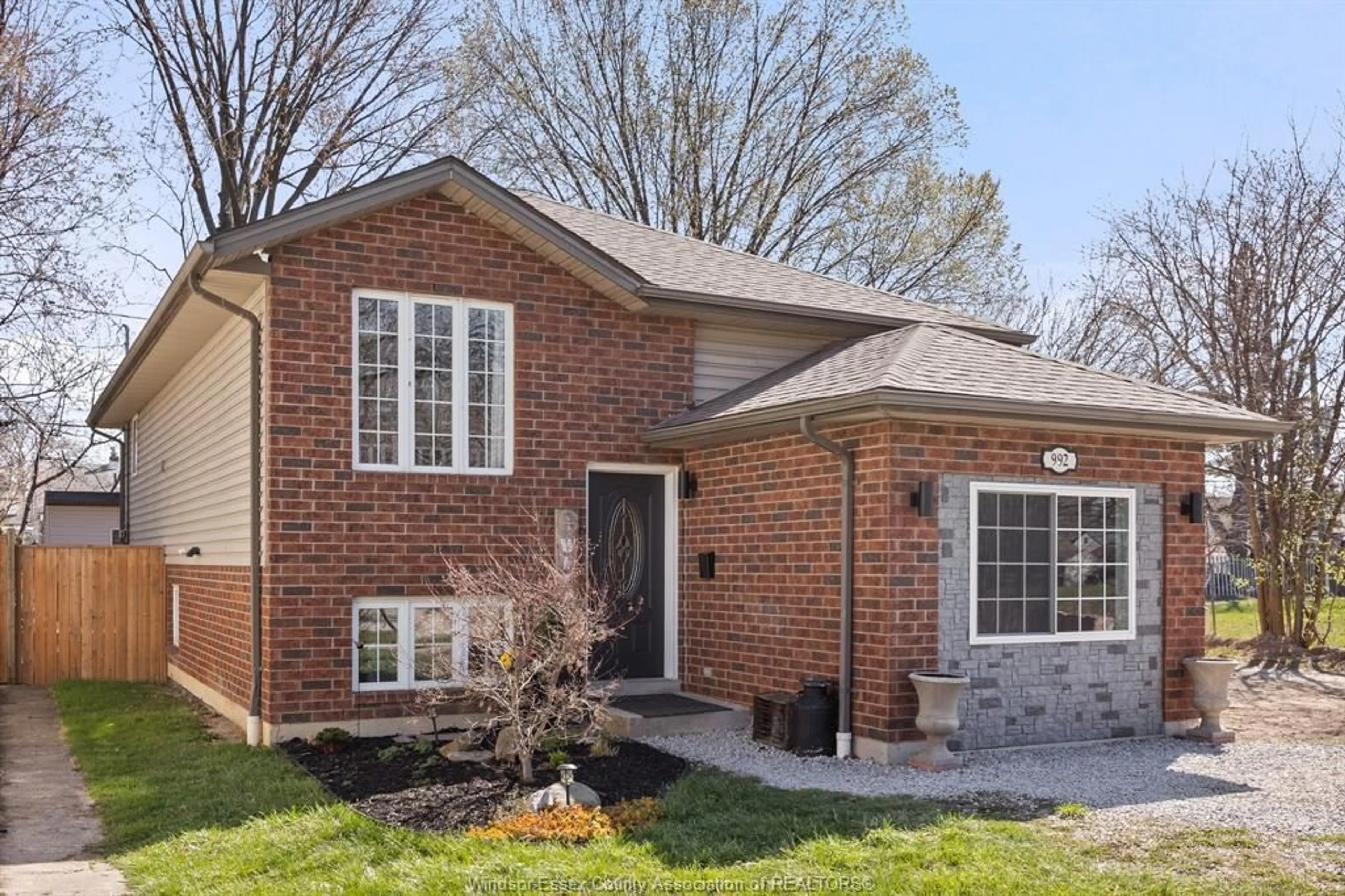 Home with brick exterior material, street for 992 Bridge Ave, Windsor Ontario N9B 2N1