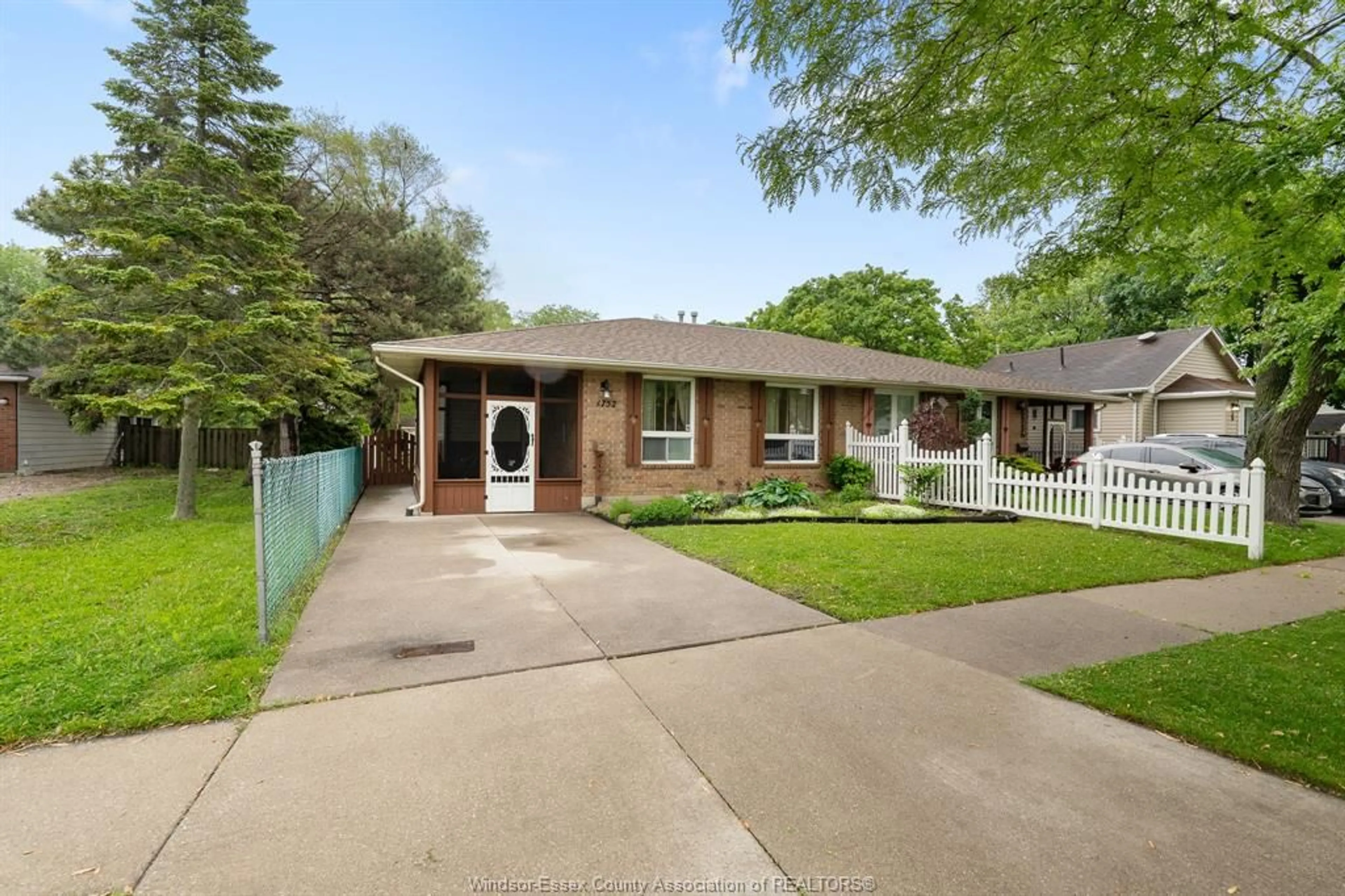 Home with brick exterior material, street for 1752 NORMAN Rd, Windsor Ontario N8Y 4N8