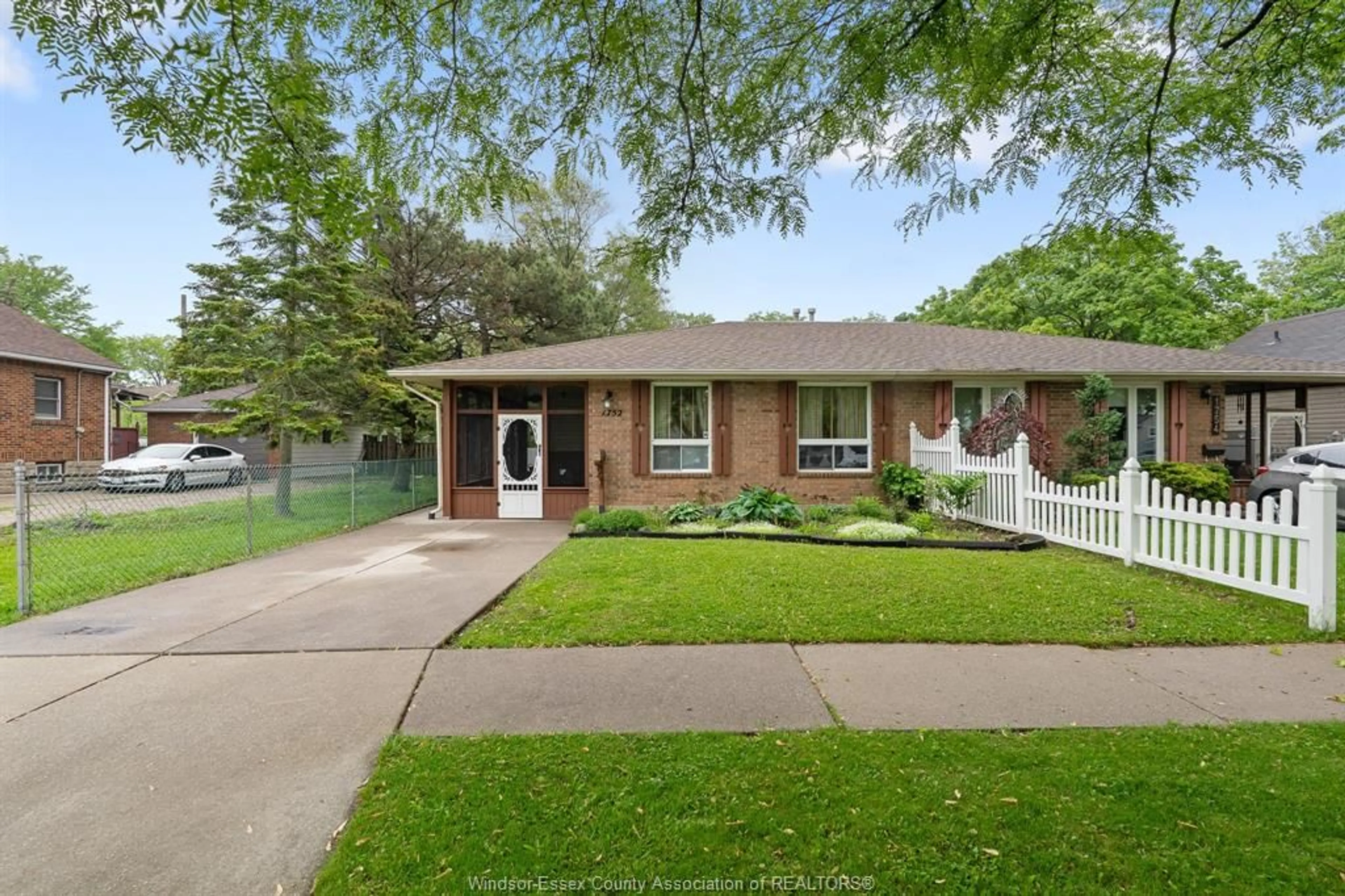 Home with brick exterior material, street for 1752 NORMAN Rd, Windsor Ontario N8Y 4N8