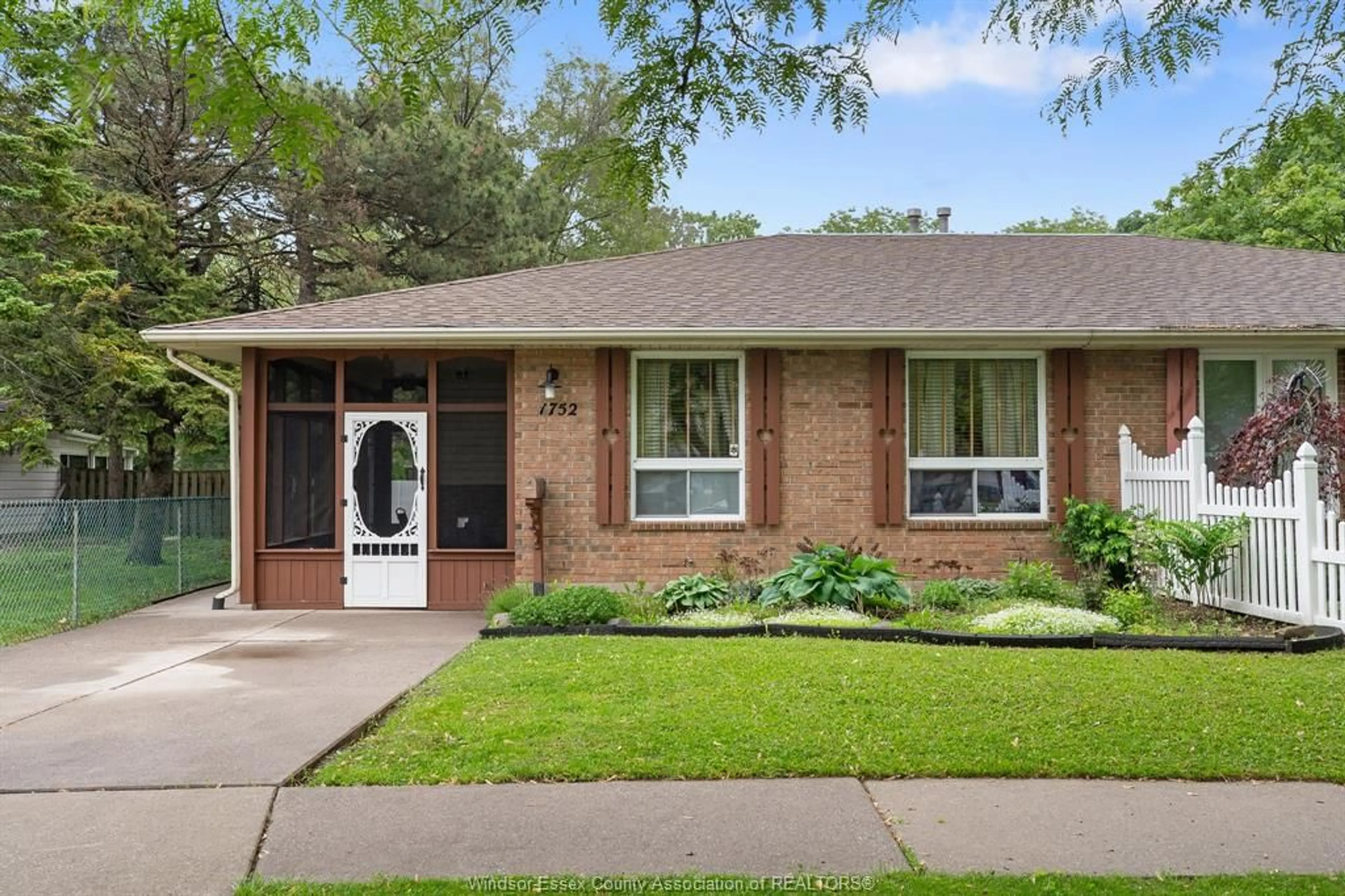 Home with brick exterior material, street for 1752 NORMAN Rd, Windsor Ontario N8Y 4N8