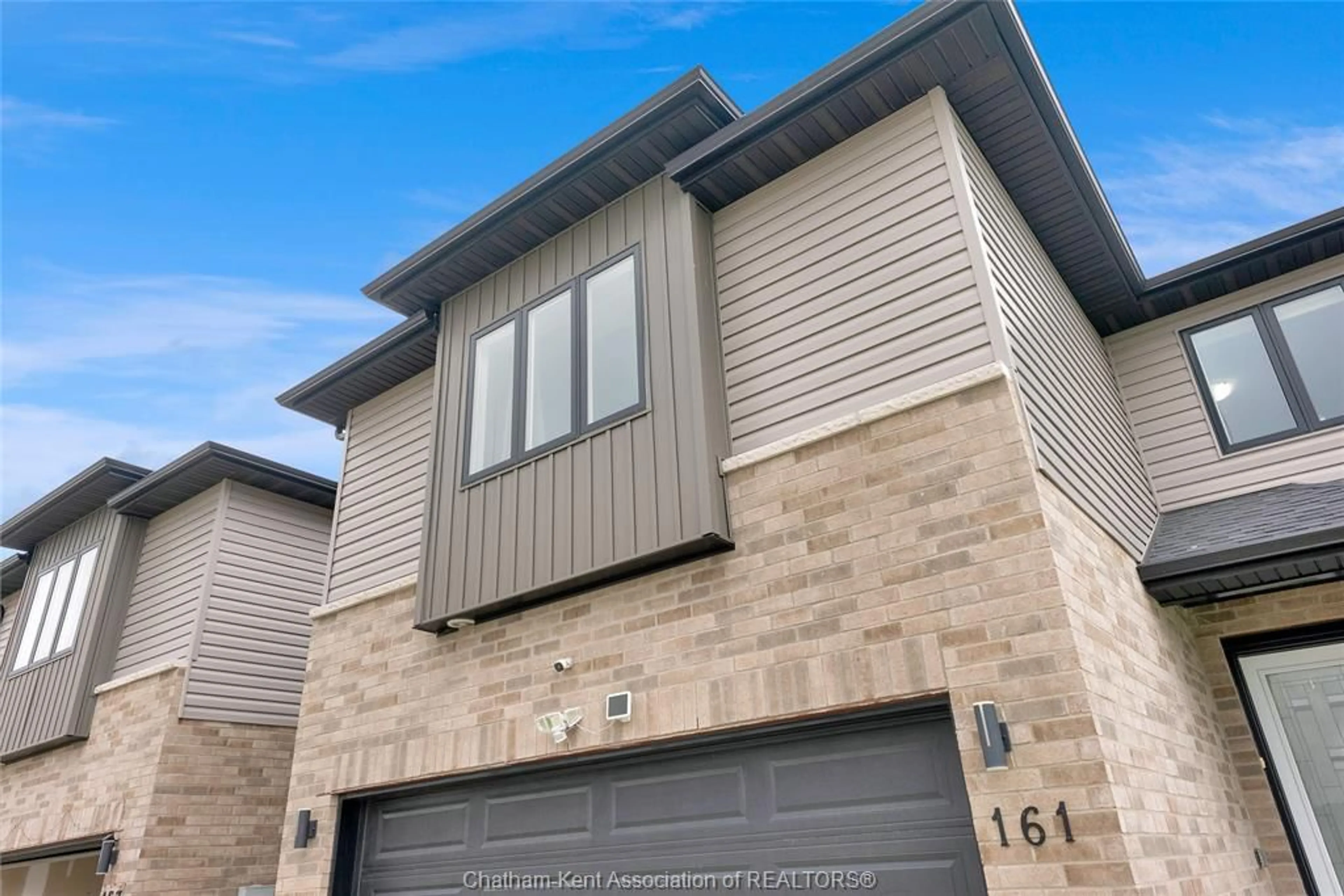 Home with brick exterior material, street for 161 Churchill Park Rd, Chatham Ontario N7M 0T9