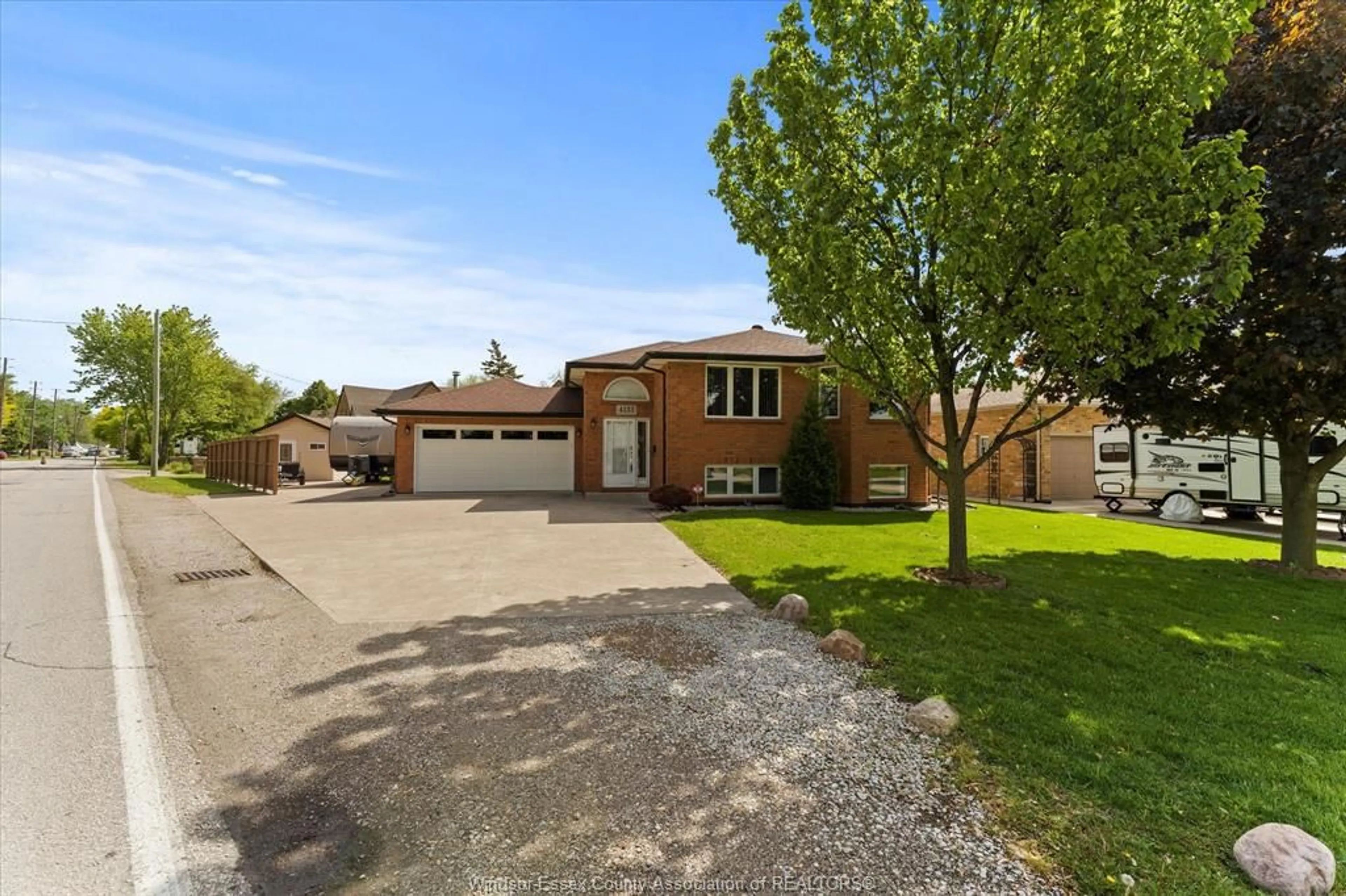 A pic from outside/outdoor area/front of a property/back of a property/a pic from drone, street for 4133 Grand Marais Rd, Windsor Ontario N8W 1X2