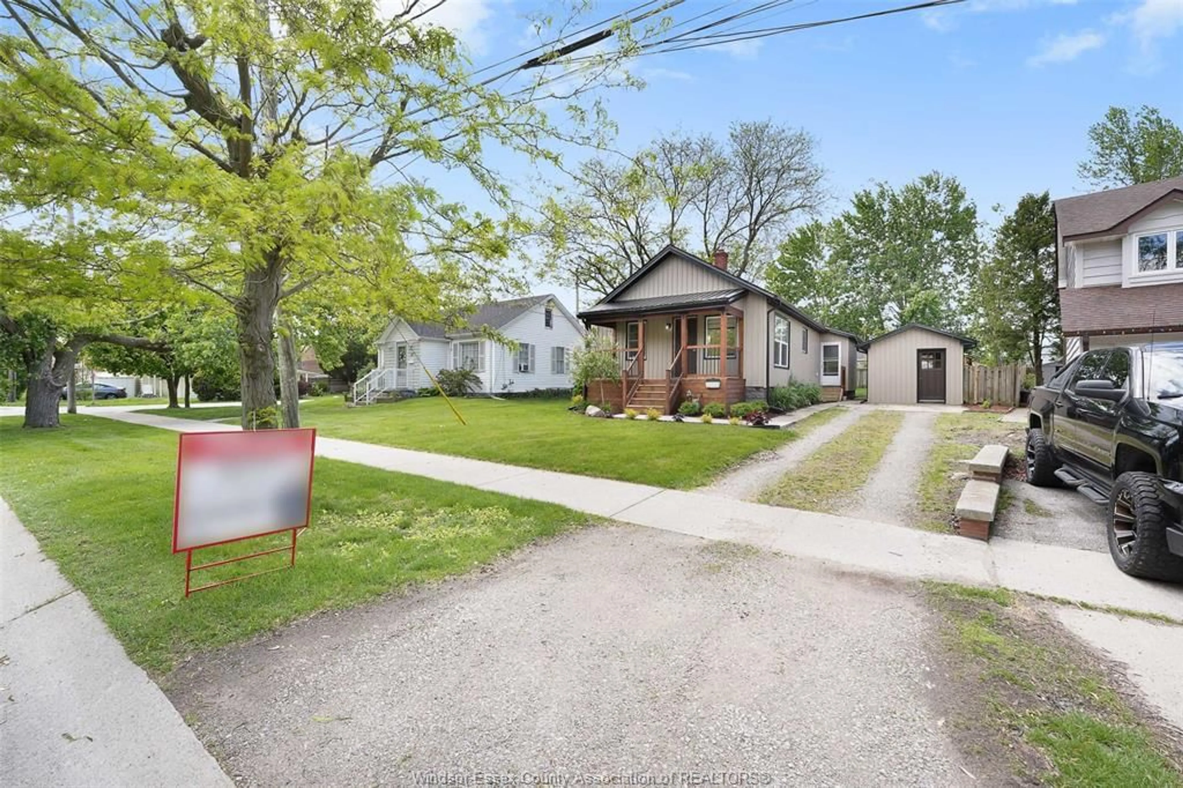 A pic from outside/outdoor area/front of a property/back of a property/a pic from drone, street for 23 Pulford St, Kingsville Ontario N9Y 1B3