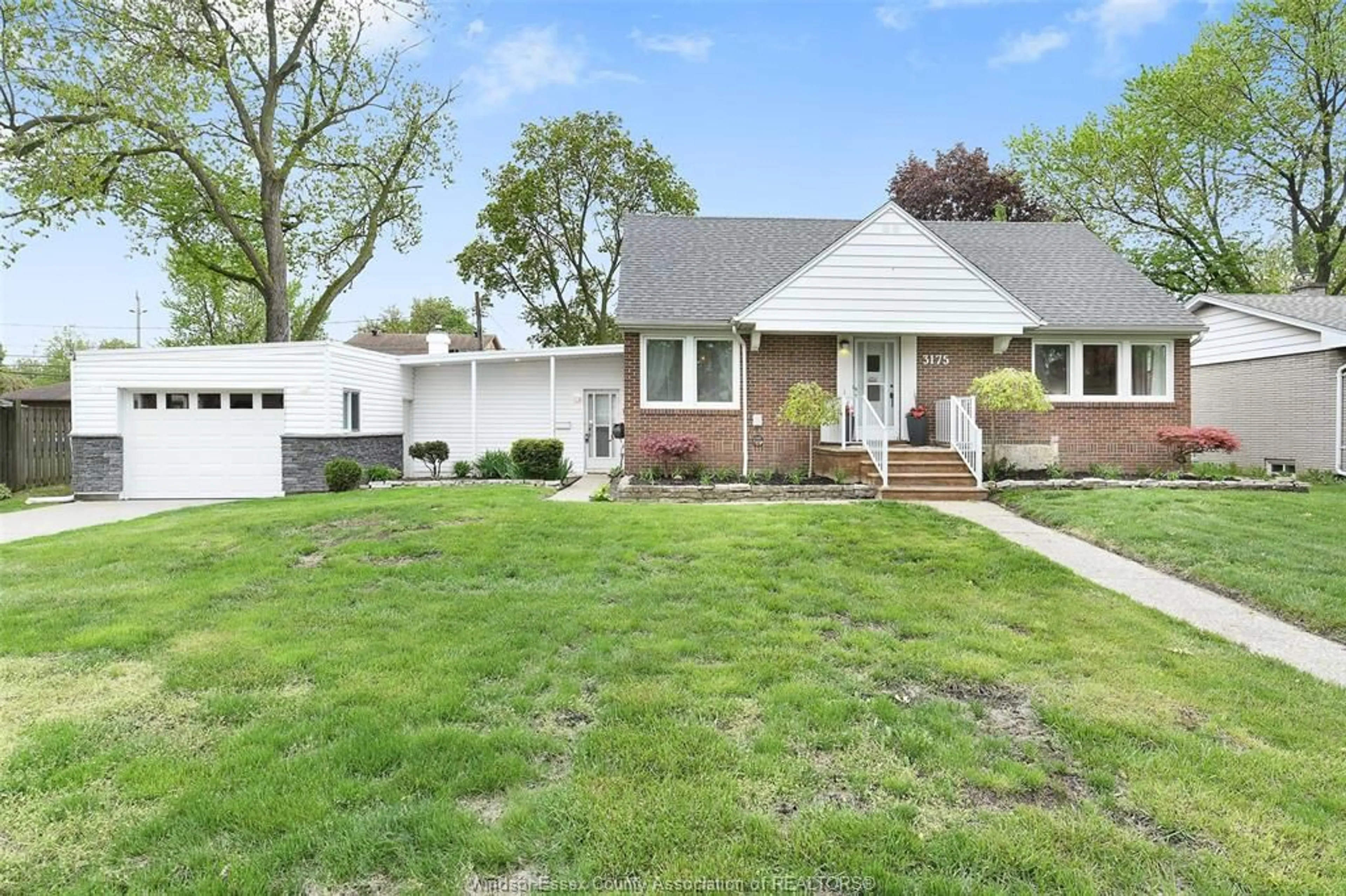 Home with brick exterior material, street for 3175 Randolph Ave, Windsor Ontario N9E 3E5