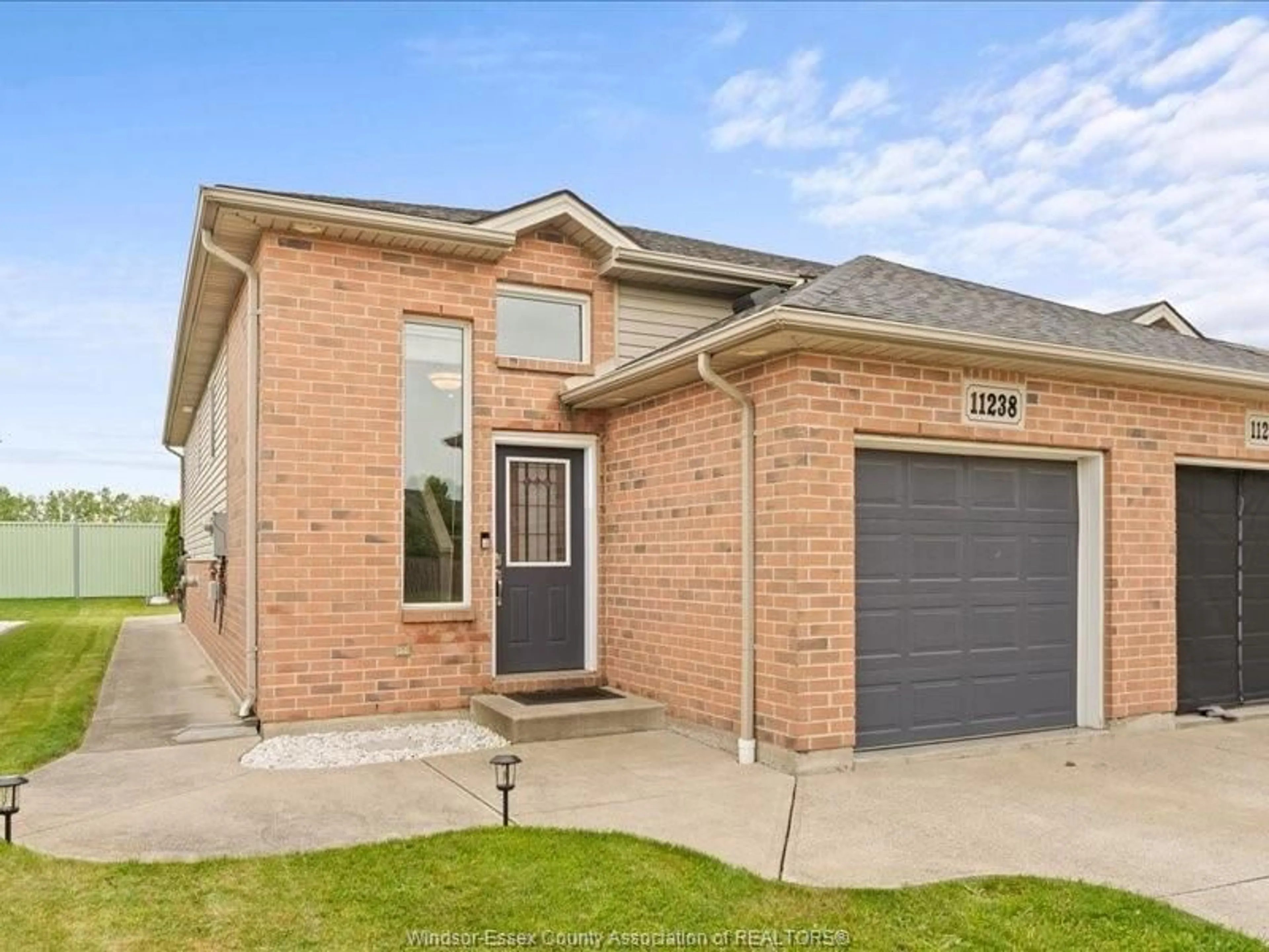 Home with brick exterior material, street for 11238 TIMBER BAY Cres, Windsor Ontario N8R 2L2