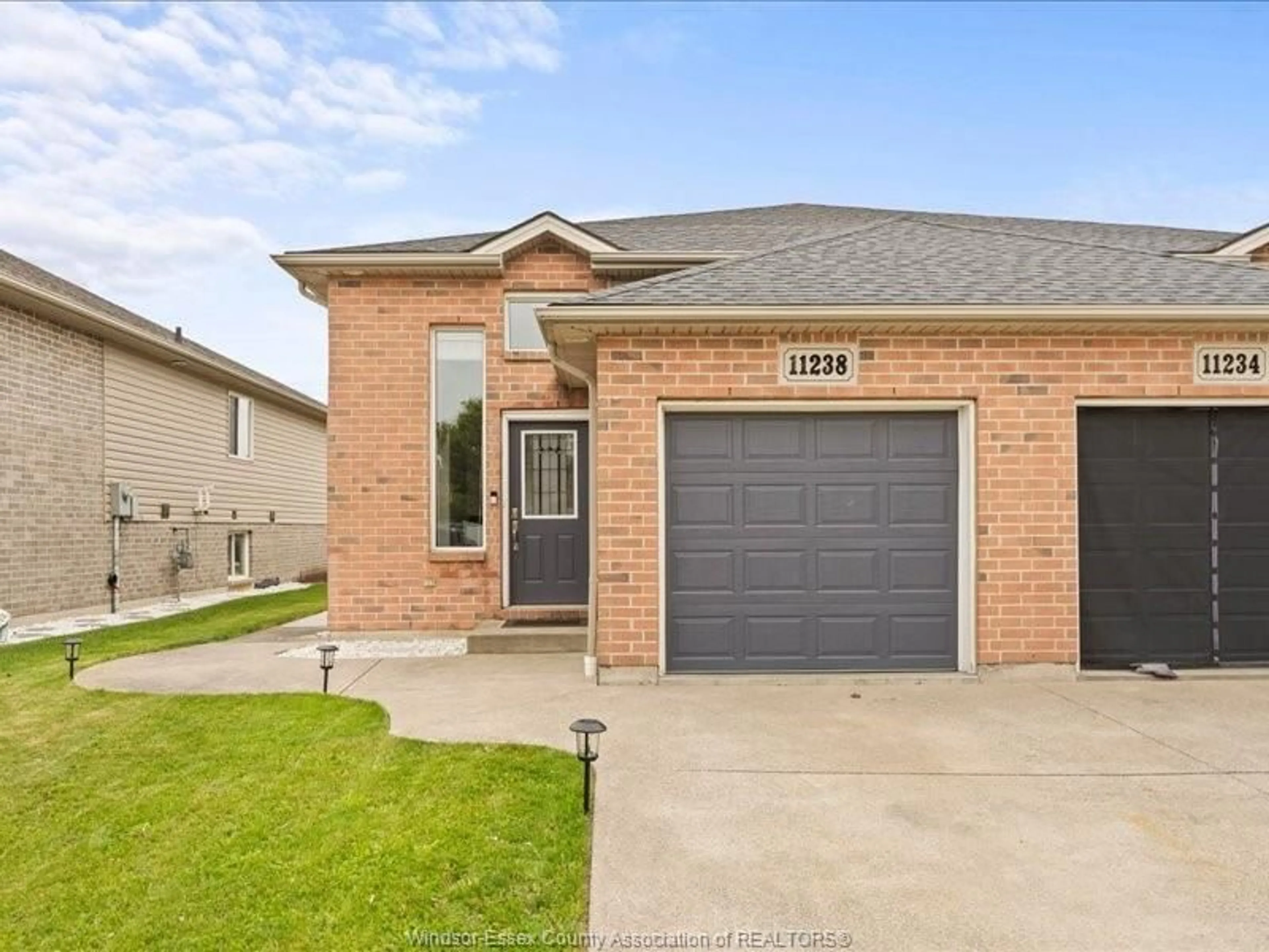 Home with brick exterior material, street for 11238 TIMBER BAY Cres, Windsor Ontario N8R 2L2