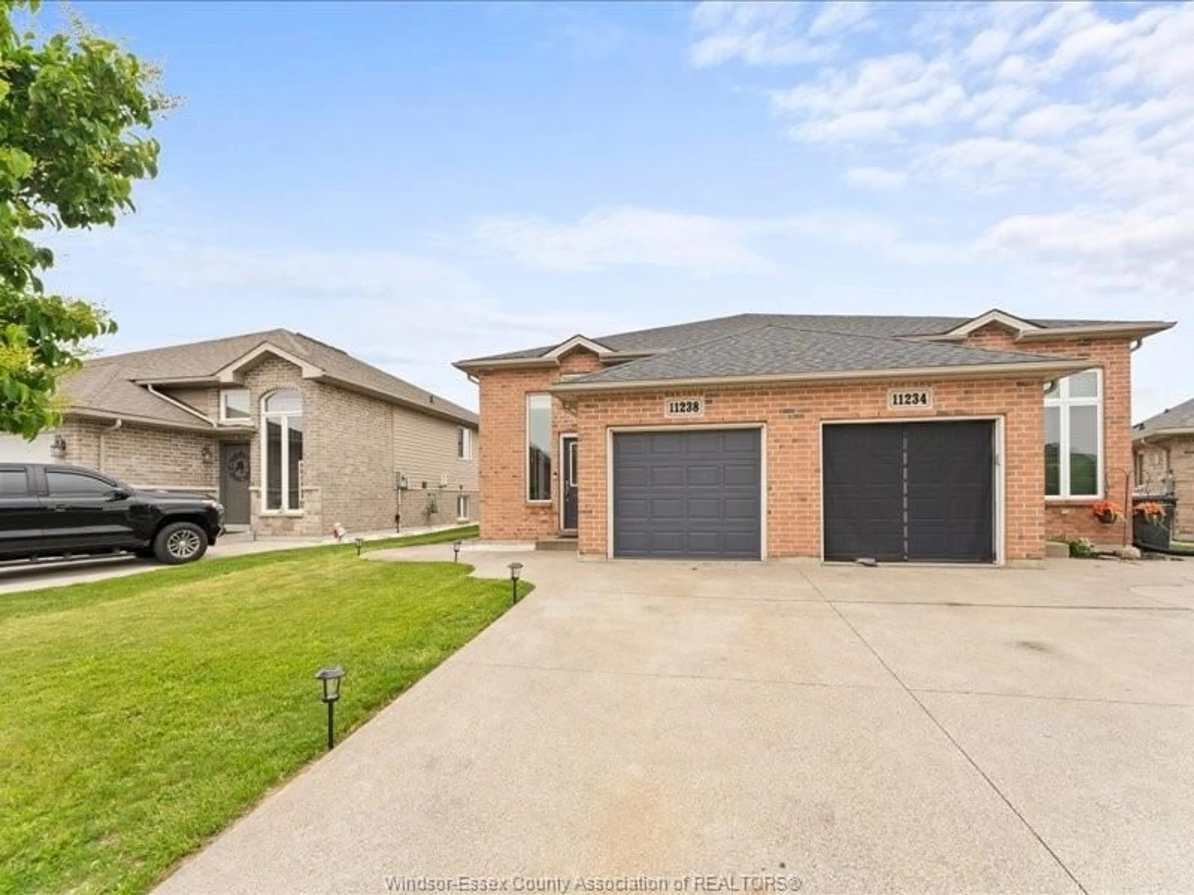 Home with brick exterior material, street for 11238 TIMBER BAY Cres, Windsor Ontario N8R 2L2