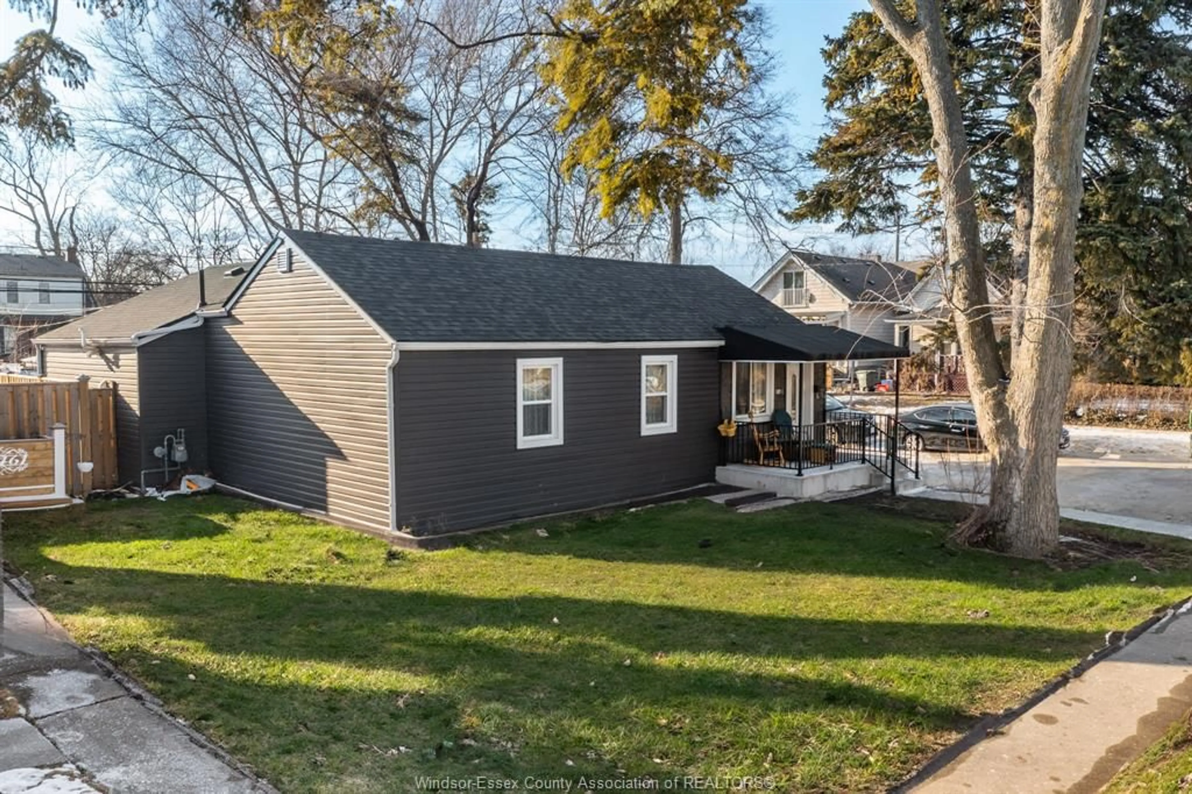 Home with vinyl exterior material, street for 1455 YORK St, Windsor Ontario N8X 1W2