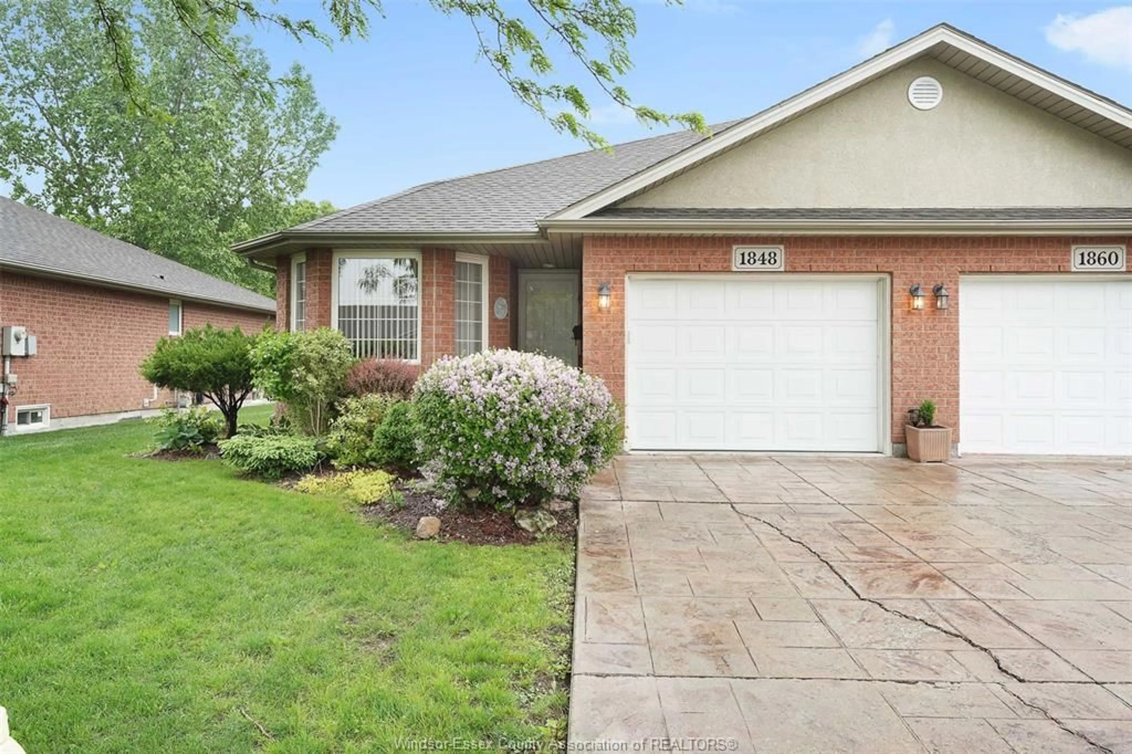 Home with brick exterior material, street for 1484 QUESTA, Windsor Ontario N8P 1M5