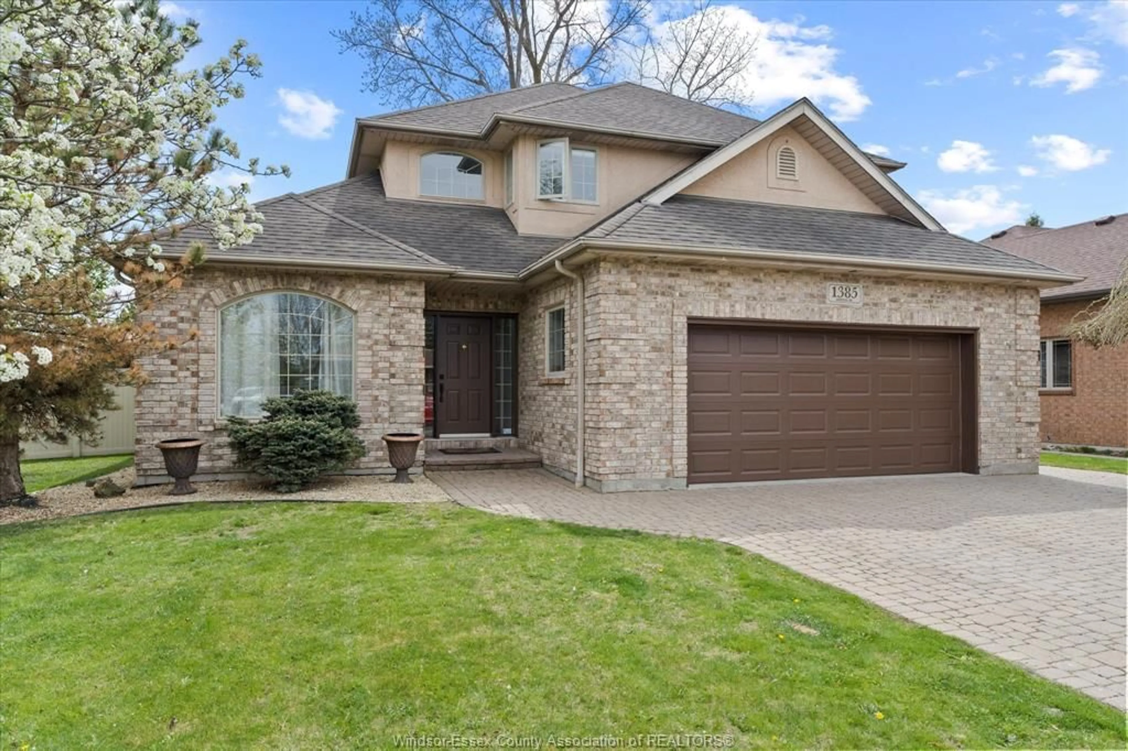 Home with brick exterior material, street for 1385 MORTON Dr, LaSalle Ontario N9J 3S9