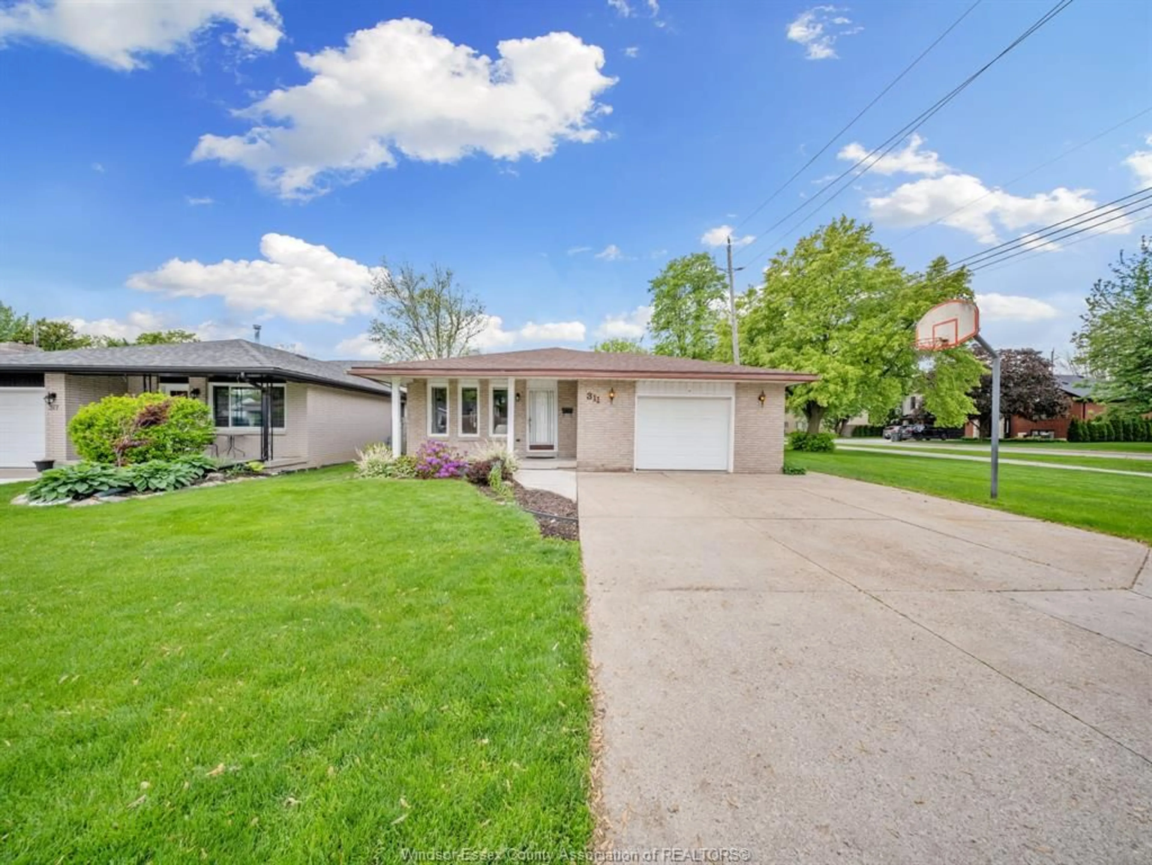 A pic from outside/outdoor area/front of a property/back of a property/a pic from drone, street for 311 DIEPPE St, Windsor Ontario N8S 3V3