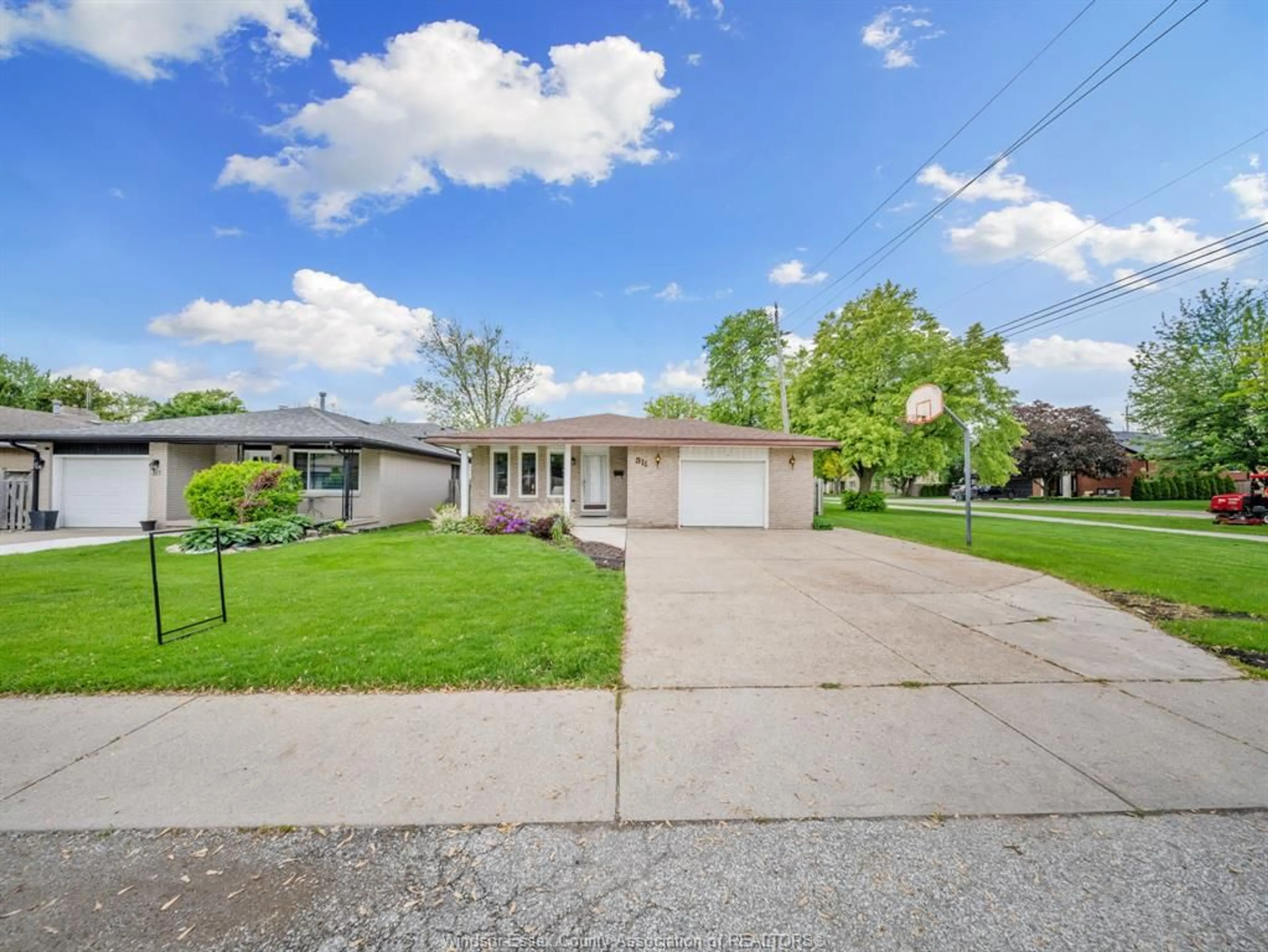 A pic from outside/outdoor area/front of a property/back of a property/a pic from drone, street for 311 DIEPPE St, Windsor Ontario N8S 3V3