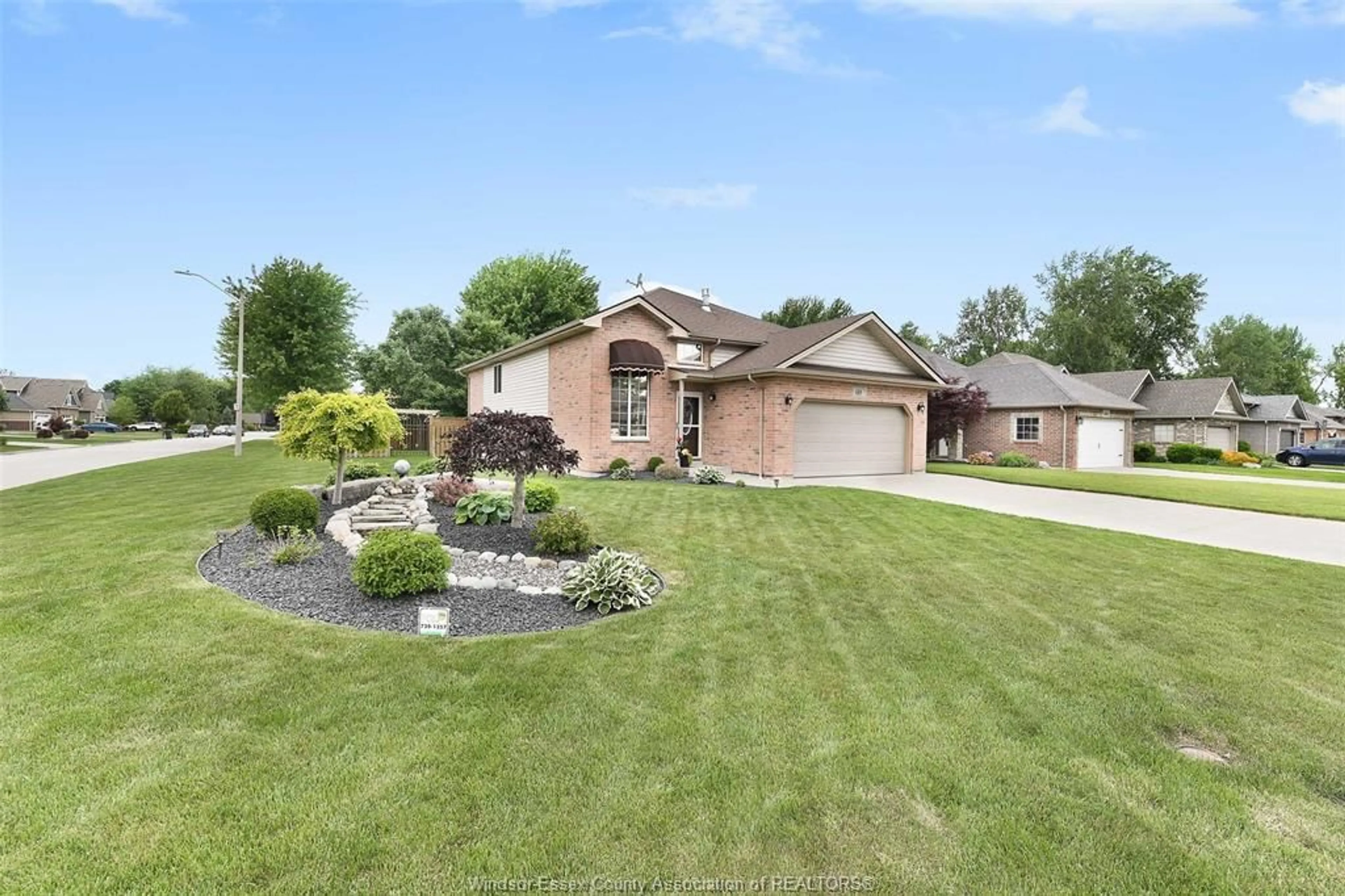 A pic from outside/outdoor area/front of a property/back of a property/a pic from drone, water/lake/river/ocean view for 689 Helena Cres, Belle River Ontario N0R 1A0