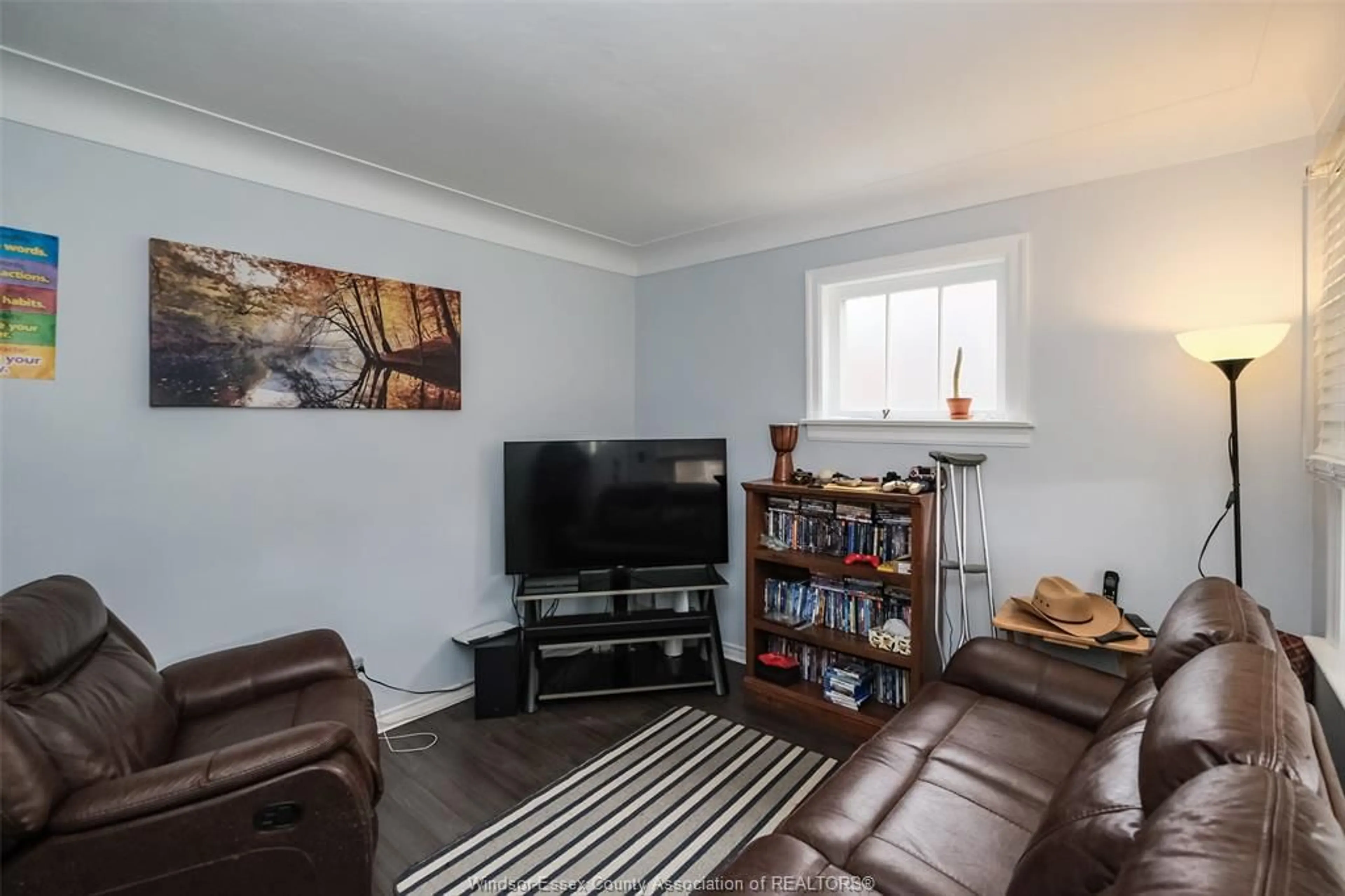 Living room with furniture, wood/laminate floor for 1523 BENJAMIN Ave, Windsor Ontario N8X 4N3