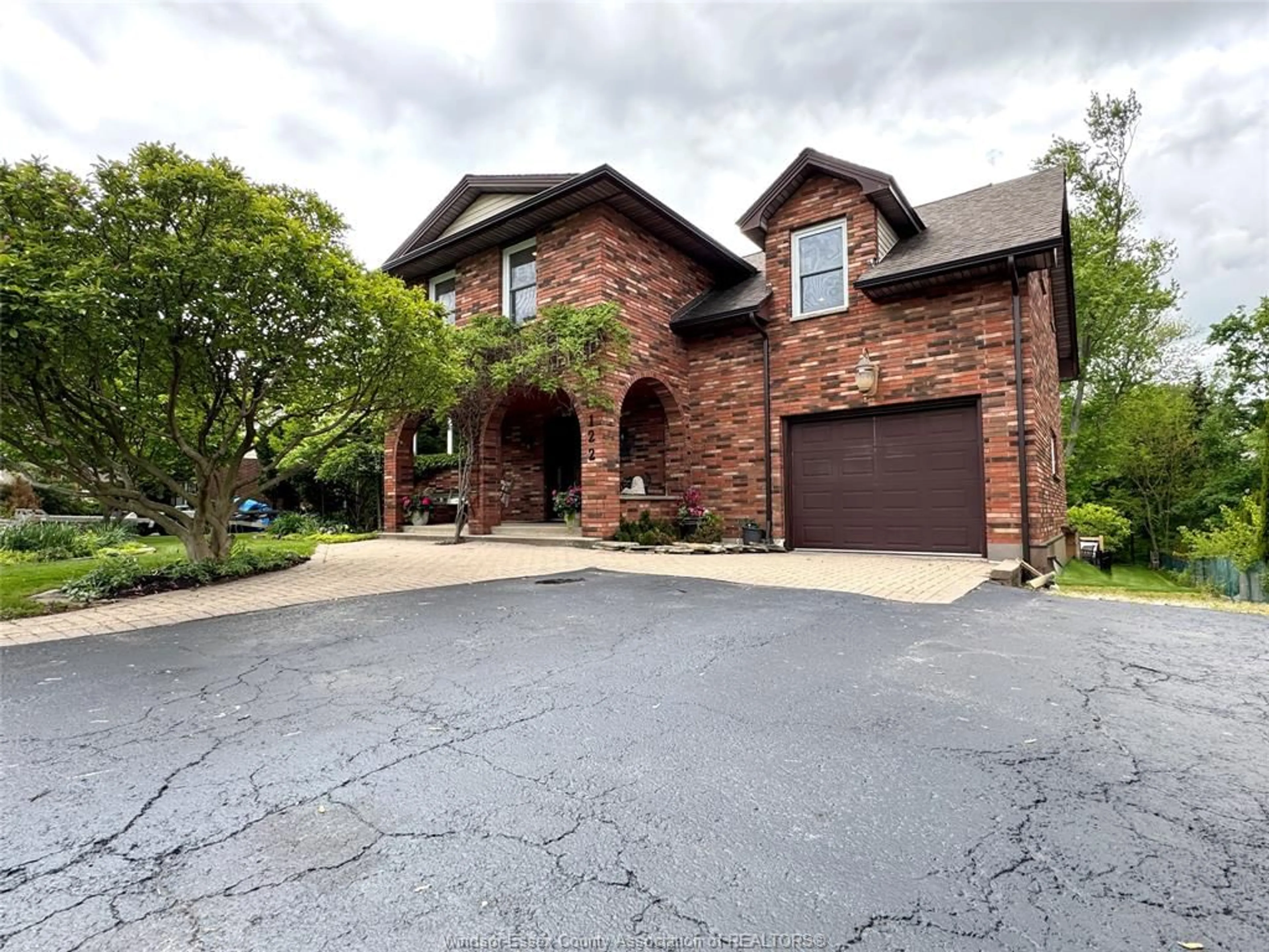 Home with brick exterior material, street for 122 AUGUSTINE Dr, Kingsville Ontario N9W 1C5