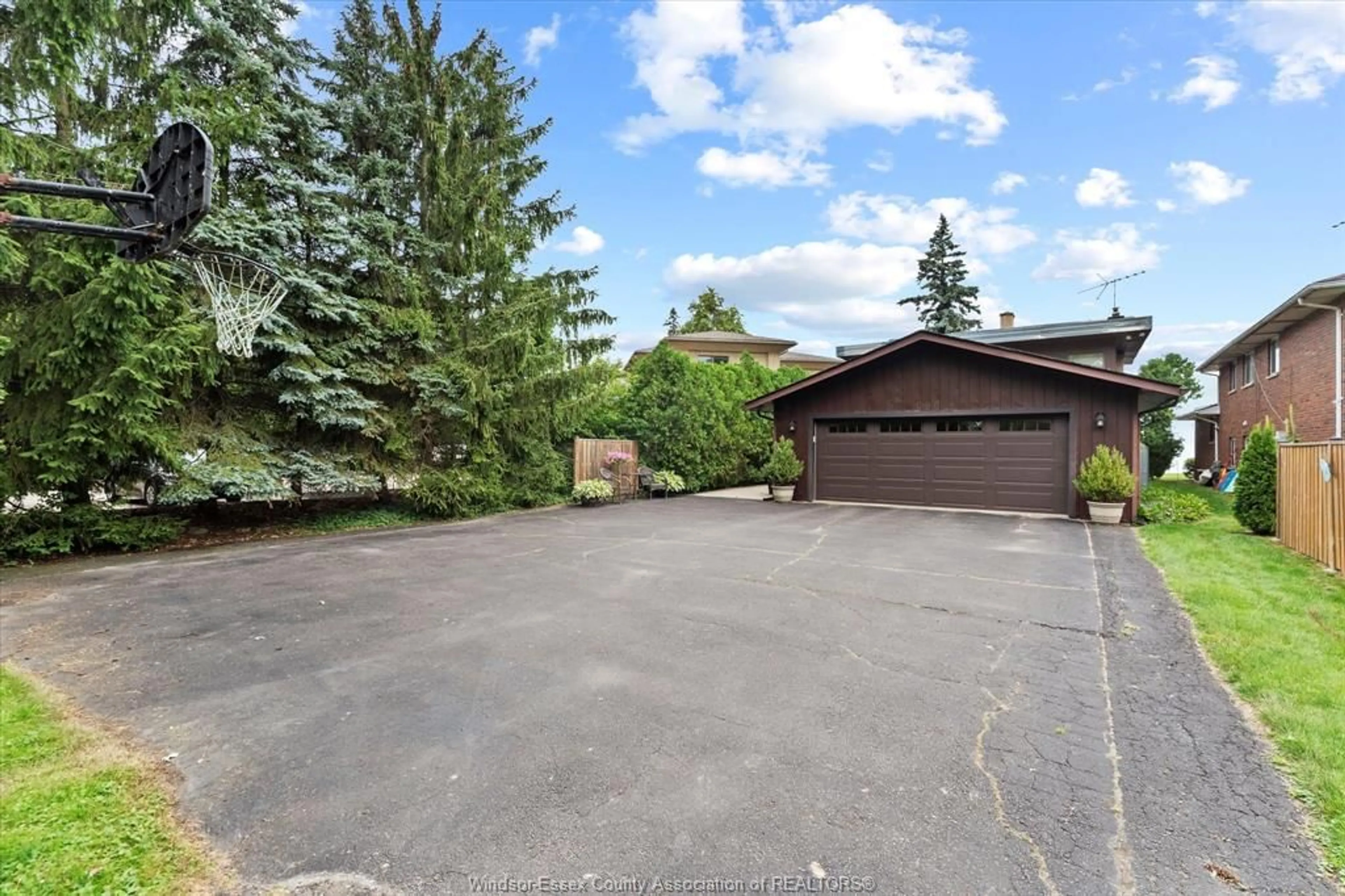 A pic from outside/outdoor area/front of a property/back of a property/a pic from drone, street for 696 Old Tecumseh Rd, Lakeshore Ontario N0R 1A0