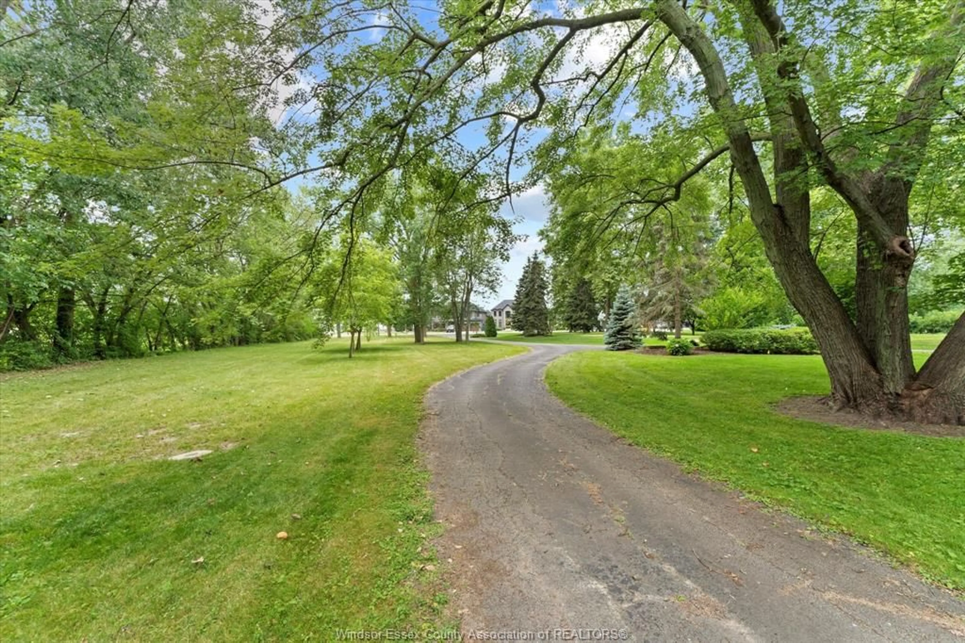 A pic from outside/outdoor area/front of a property/back of a property/a pic from drone, street for 696 Old Tecumseh Rd, Lakeshore Ontario N0R 1A0