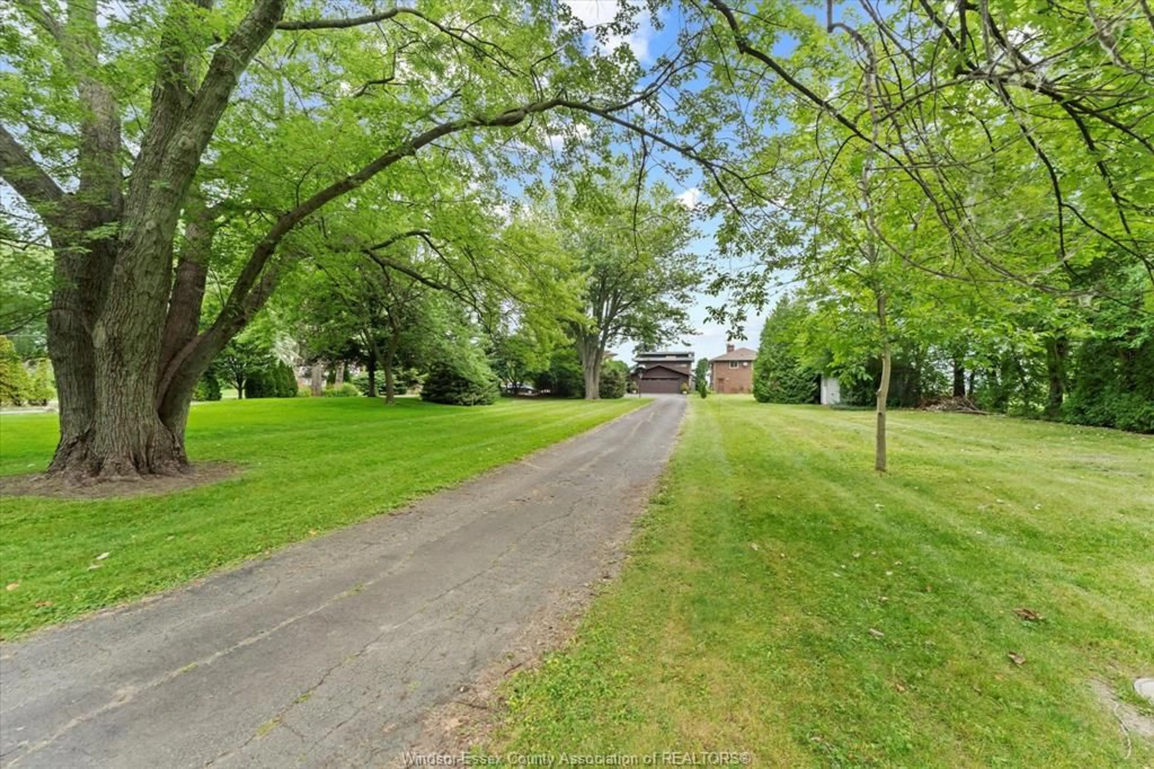 A pic from outside/outdoor area/front of a property/back of a property/a pic from drone, street for 696 Old Tecumseh Rd, Lakeshore Ontario N0R 1A0