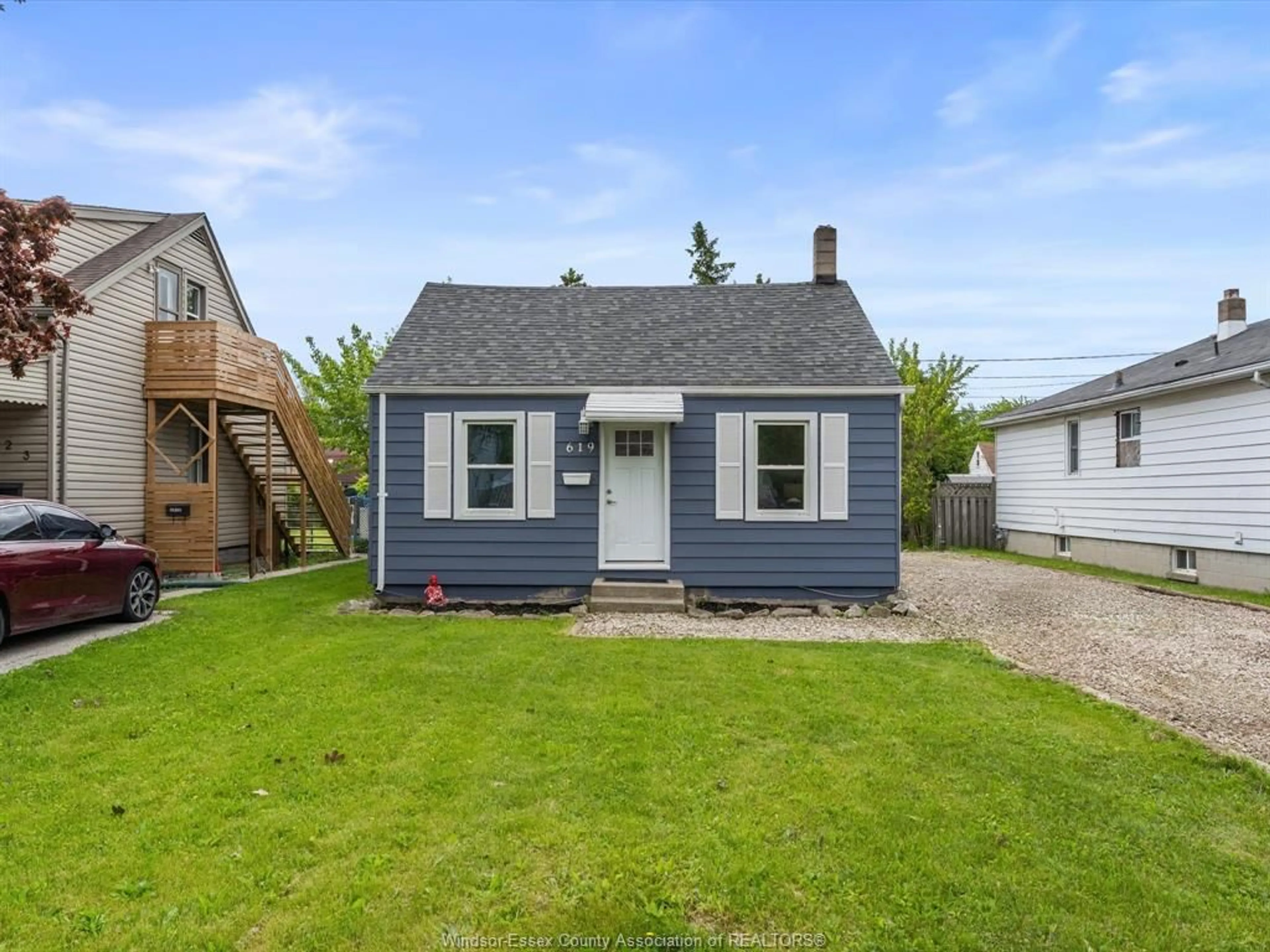 Home with vinyl exterior material, street for 619 Edinborough St, Windsor Ontario N8X 3C1
