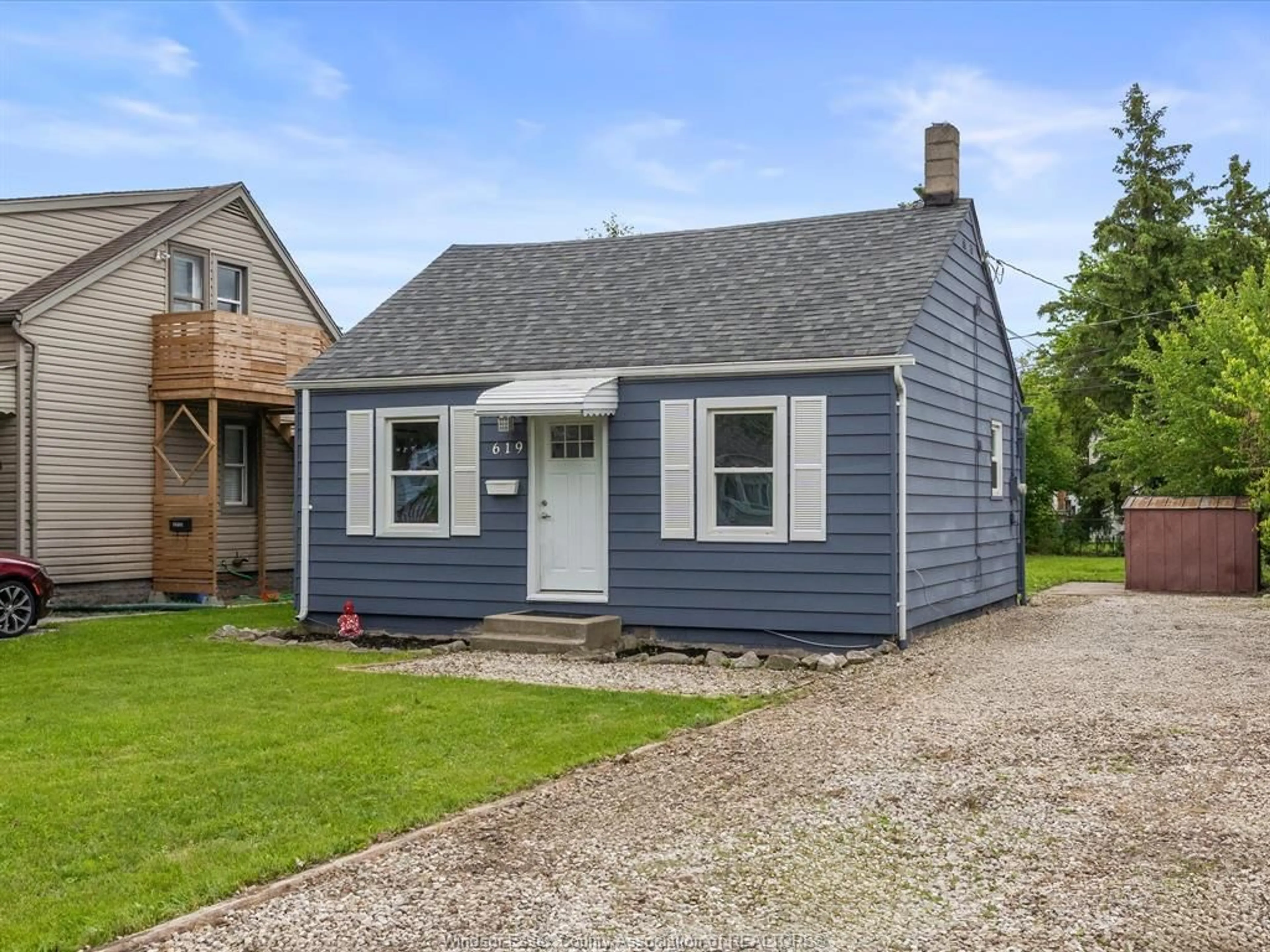 Home with vinyl exterior material, street for 619 Edinborough St, Windsor Ontario N8X 3C1