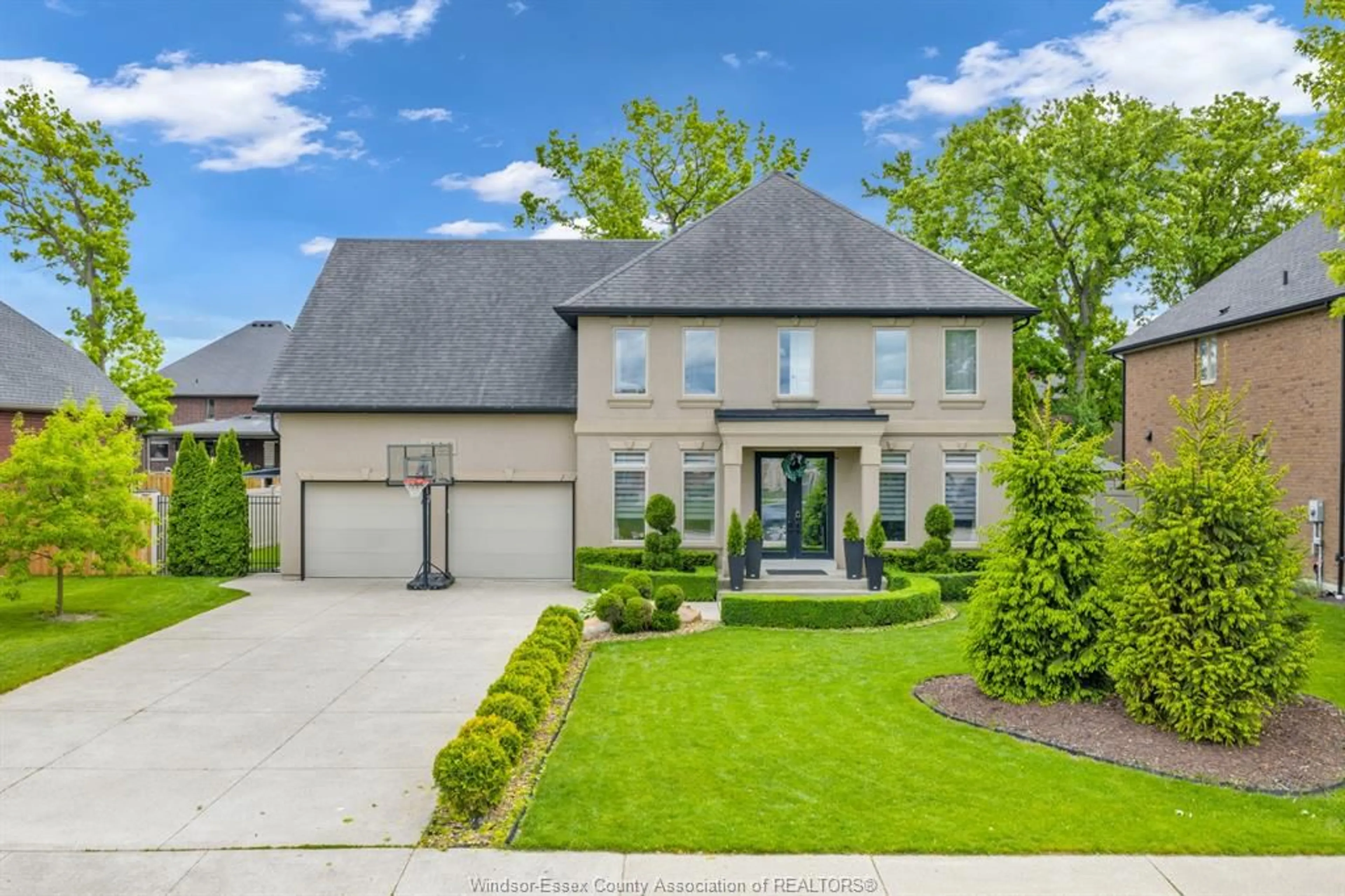 Home with brick exterior material, street for 1083 REGENCY Cres, Lakeshore Ontario N0R 1A0