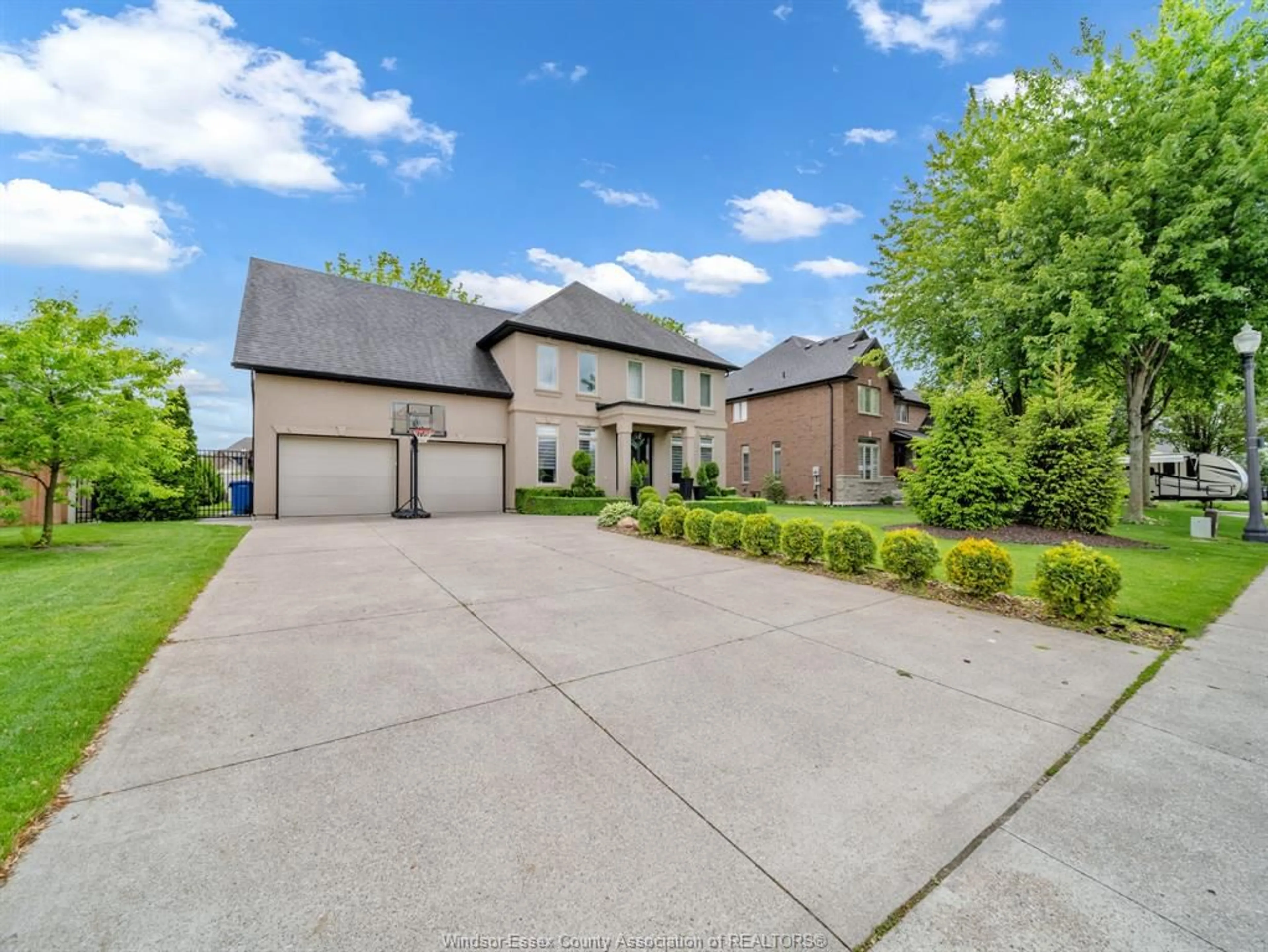 Home with brick exterior material, street for 1083 REGENCY Cres, Lakeshore Ontario N0R 1A0